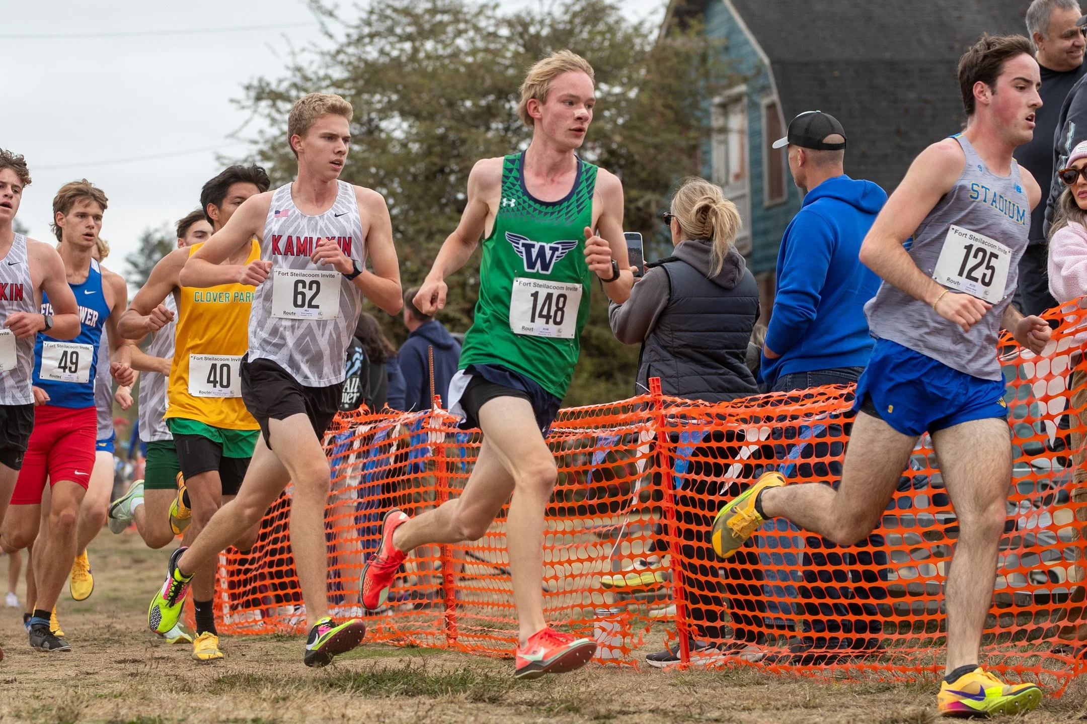 High school athlete competing in a cross country race at the Fort Steilacoom Invitational at Fort Steilacoom Park in Lakewood, Washington.