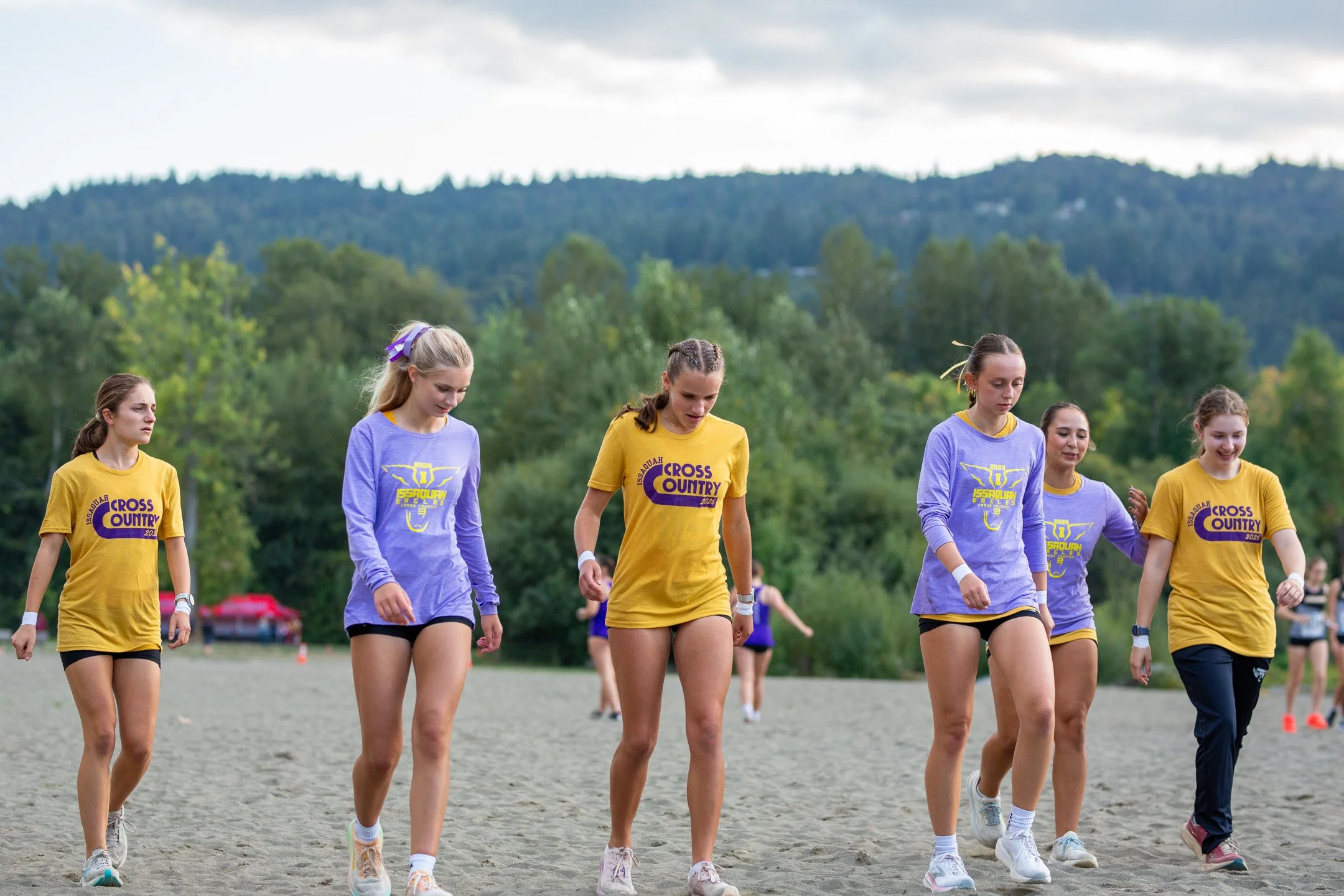 Issaquah cross country athletes warm up before racing at the KingCo Class Races.