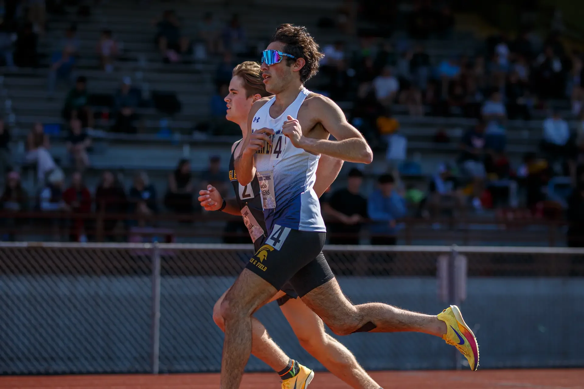 Ignacio Llorens of Bainbridge High School running on a track. Top contender for the 2026 WIAA 2A 1600m State Championships.