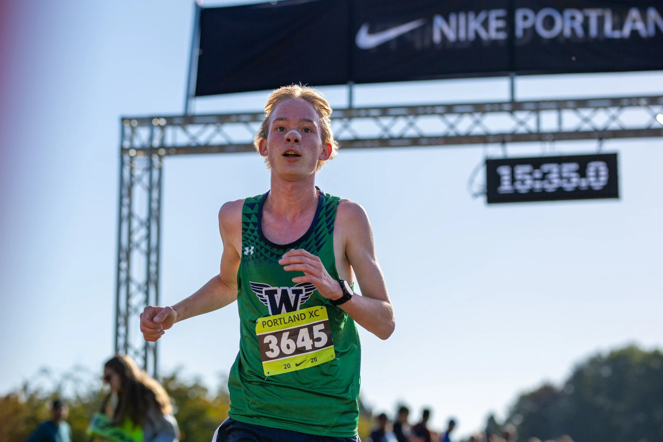 Woodinville's Oskari Vuorela approaching the finish at the 2026 Nike Portland XC Invitational