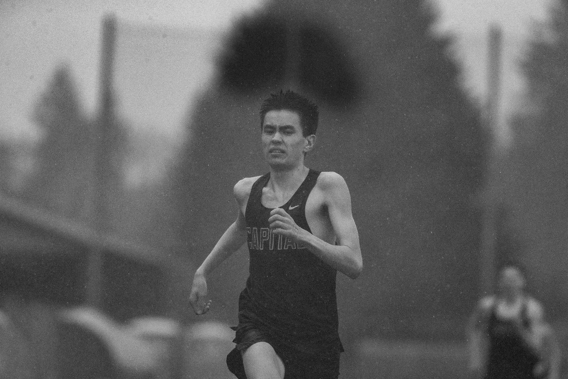 Jae Walz of Capital High School running on a track. Top contender for the 2026 WIAA 3A 800m State Championships.