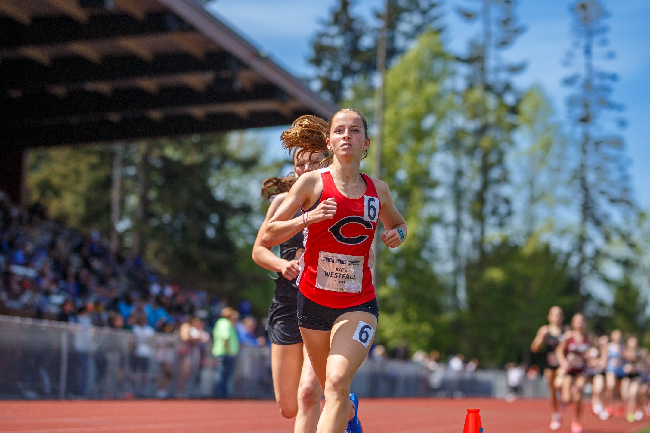 High school athlete competing in a track and field event at the South Sound Classic meet at Sparks Stadium in Puyallup, Washington.