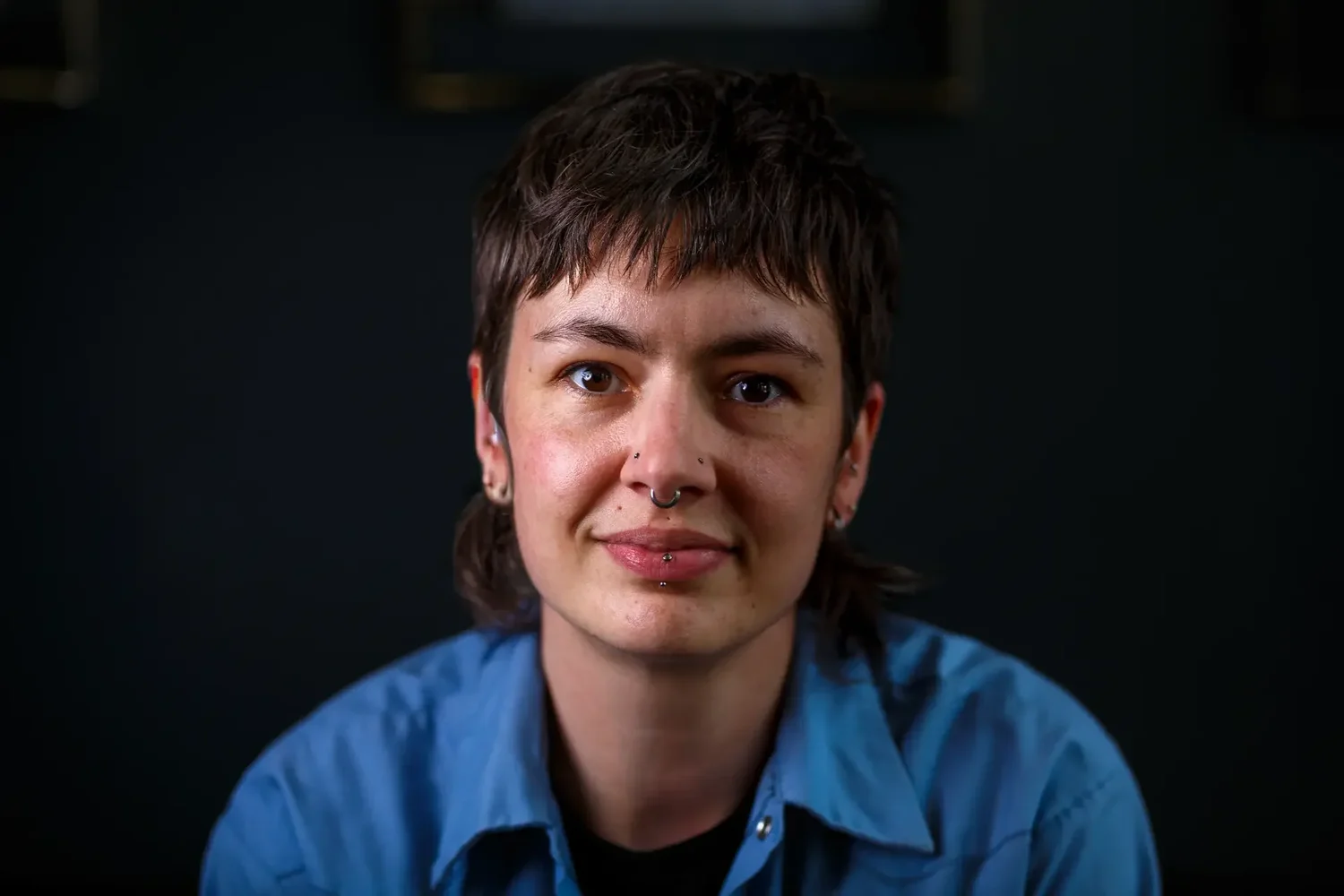 Headshot of barber Lucy Thomas at Shear Barber Studio in Olympia