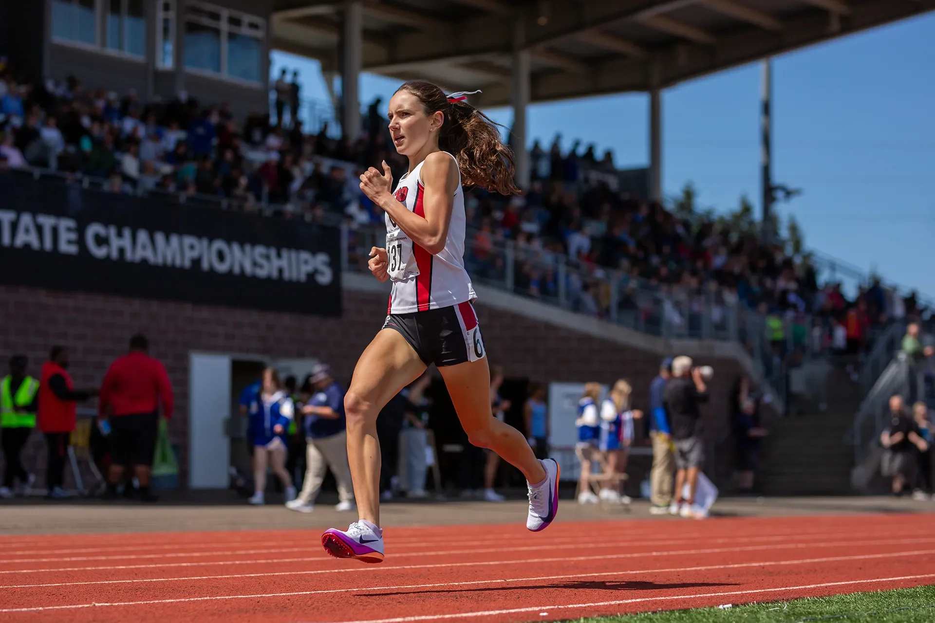 Cassidy Armstrong of Ballard High School dominating her distance race.