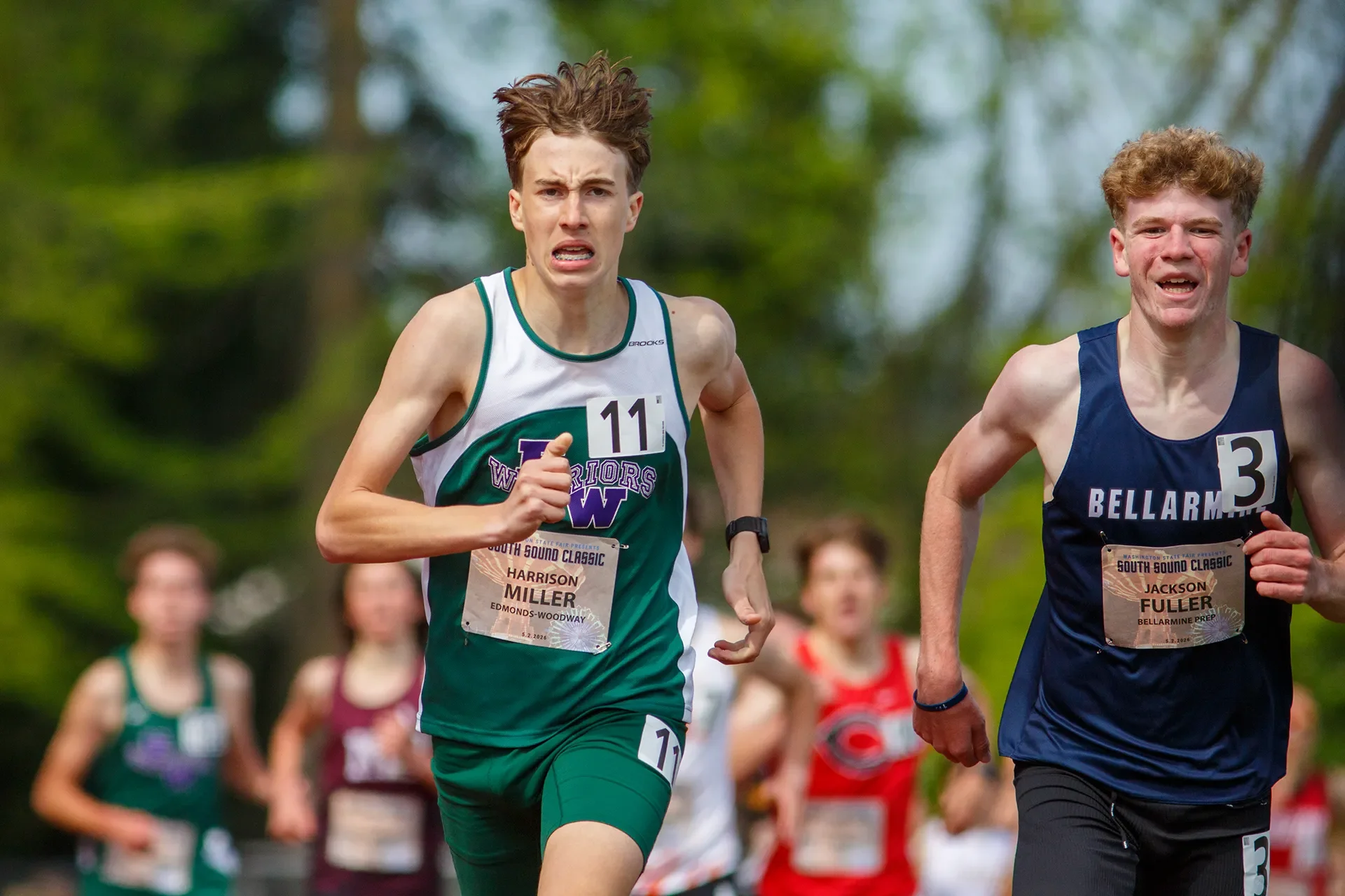 Washington high school track freshmen Harrison Miller of Edmonds-Woodway and Jackson Fuller of Bellarmine Prep battling shoulder-to-shoulder at the South Sound Classic.