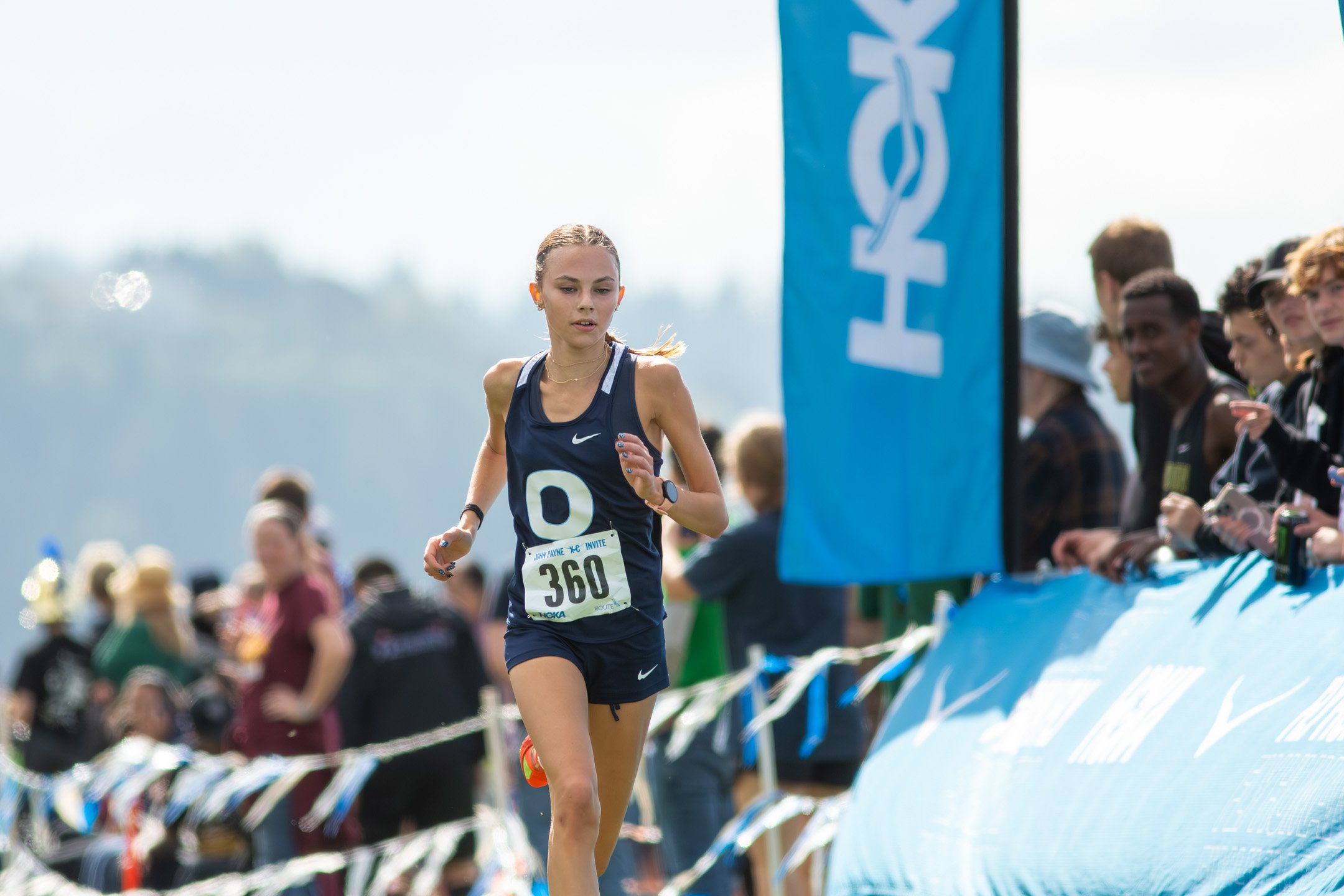 Olympia's Leah Hennen racing at the 2025 Hoka John Payne Invitational