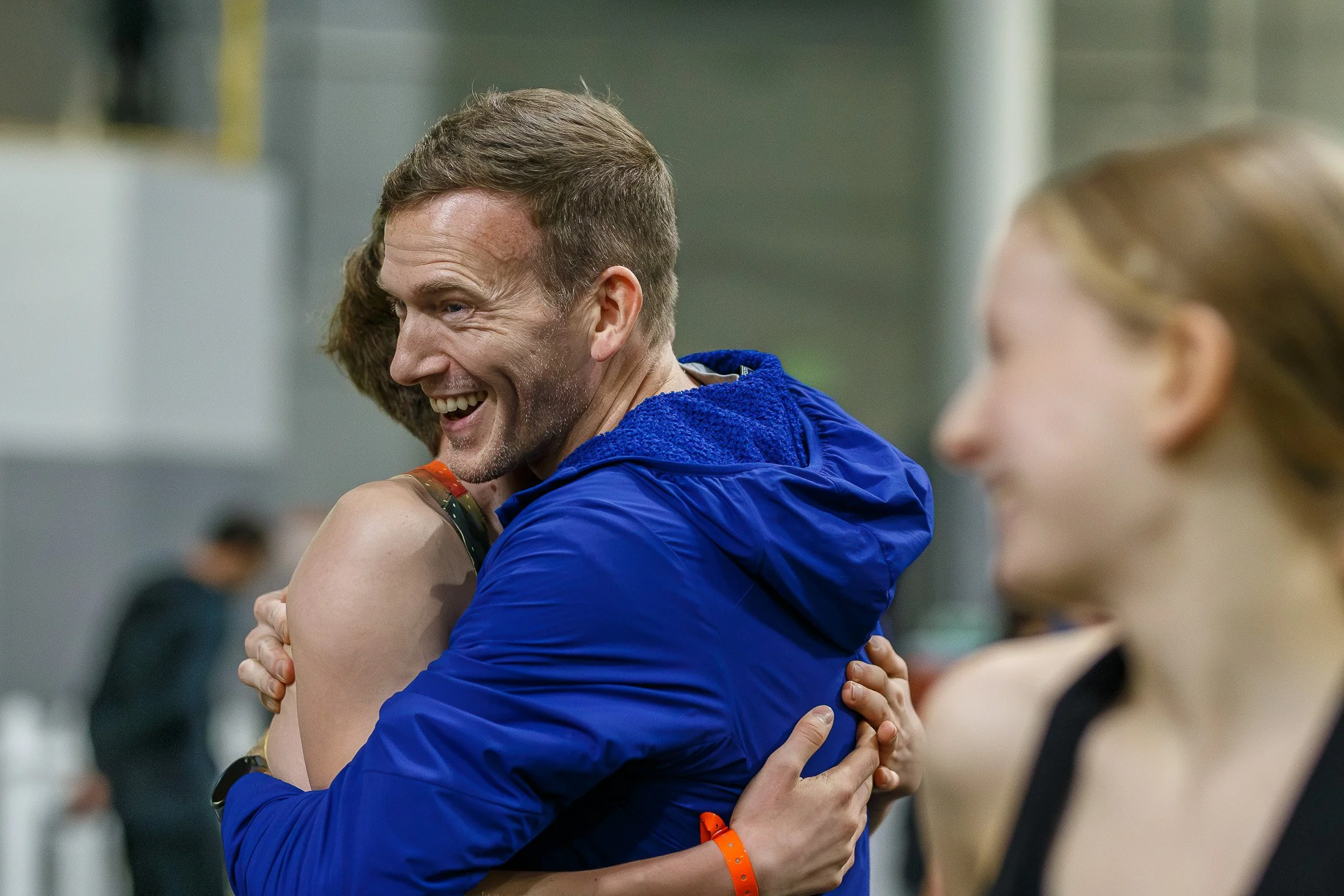 Quenton Lanese embracing his father, Chris, after his race at the Mile City meet.