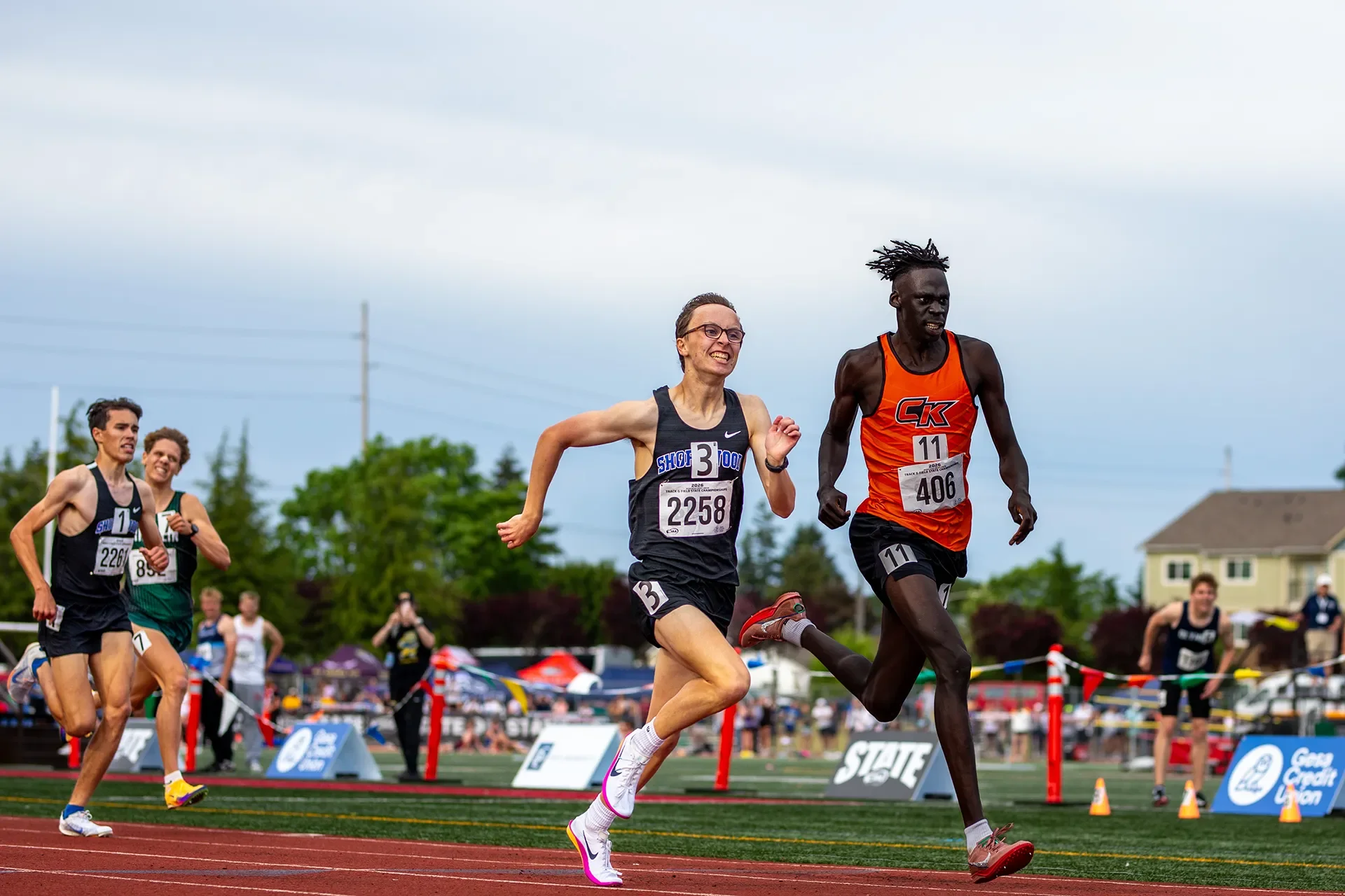 Mana Voss of Central Kitsap High School out-kicking Max Billett to win the 3A boys 1600M state title.