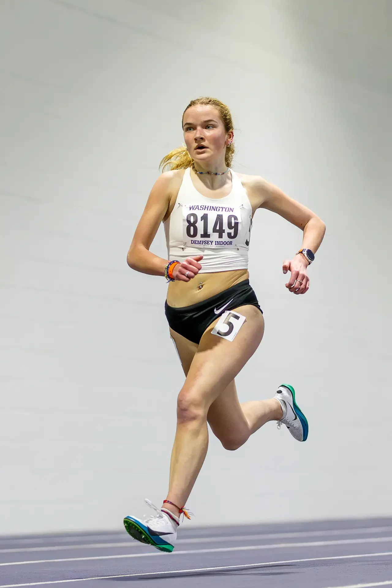 Sara Thompson of Union High School running on a track. Top contender for the 2026 WIAA 2A 3200m State Championships.