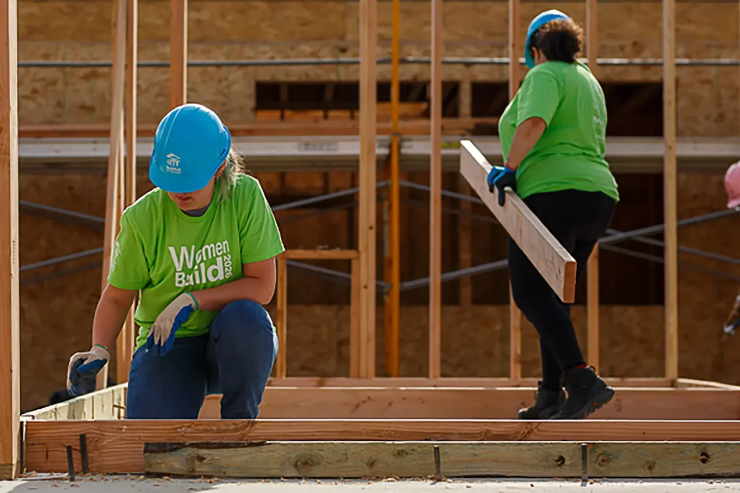 Volunteers framing a wall at the 2026 South Puget Sound Habitat for Humanity Women Build