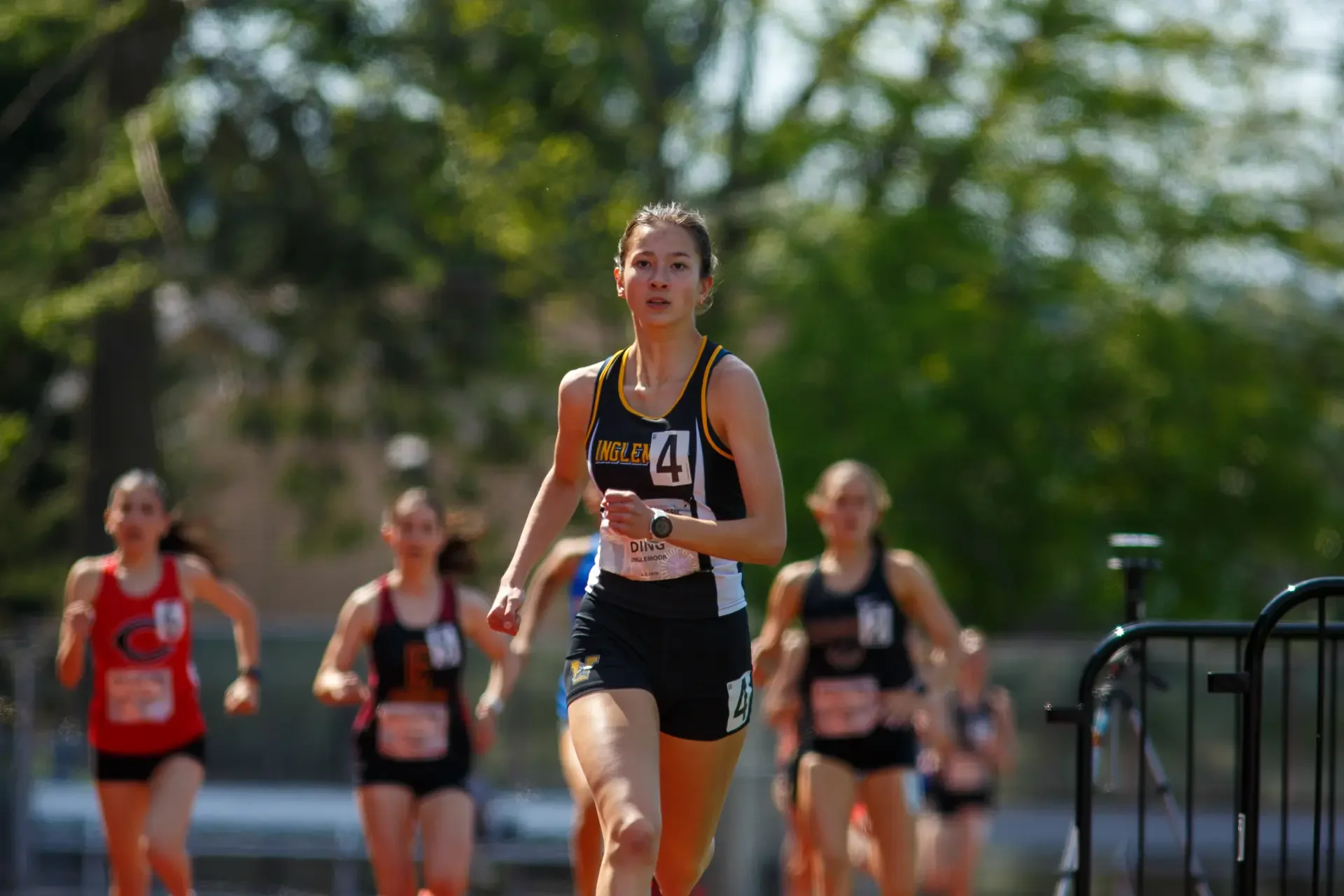 Grace Ding of Inglemoor running on a track. Top contender for the 2024 WIAA 4A 1600m State Championships.