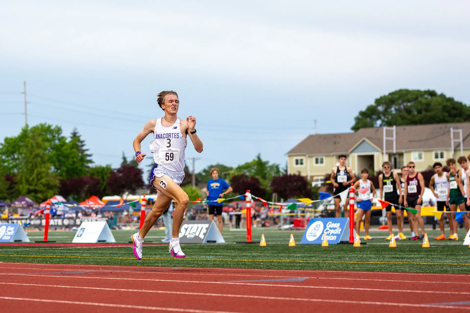 Dylan Rowell of Anacortes High School leading the pack in the 2A boys 1600M state championship final.