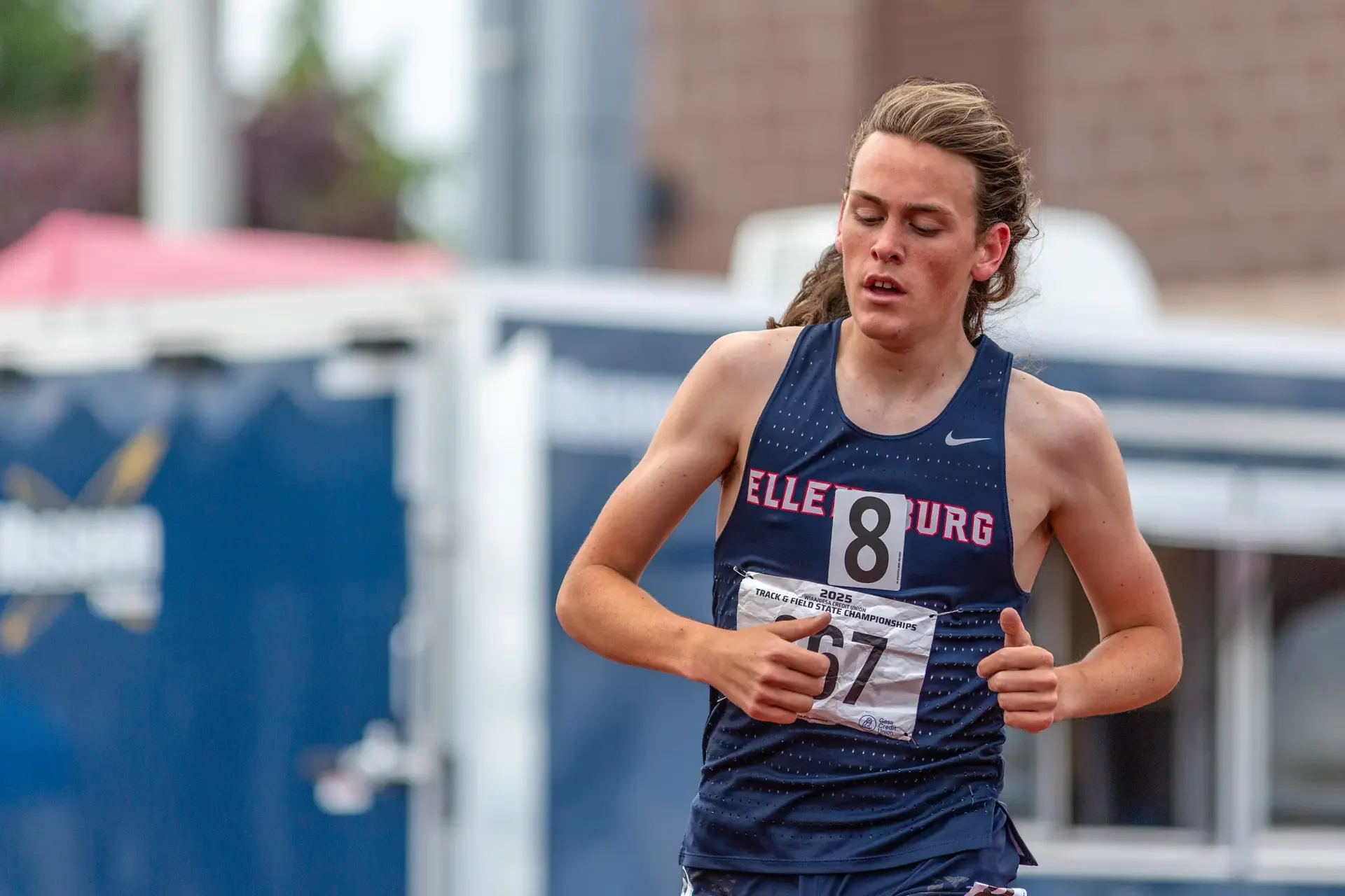 Mystic Hammond of Ellensburg running on a track. Top contender for the 2026 WIAA 2A 3200m State Championships.