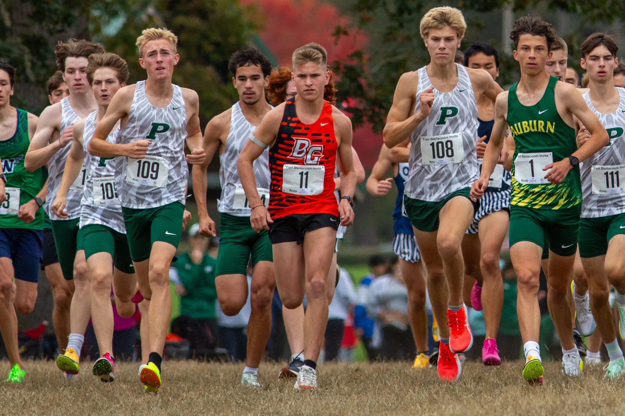 High school athlete competing in a cross country race at the Fort Steilacoom Invitational at Fort Steilacoom Park in Lakewood, Washington.