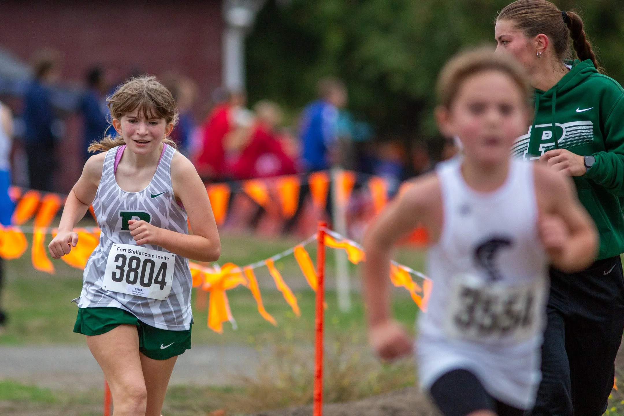 Aurelia Hawkins of Peninsula High School competing in a 2-mile cross country race at Fort Steilacoom Park in Lakewood, WA.