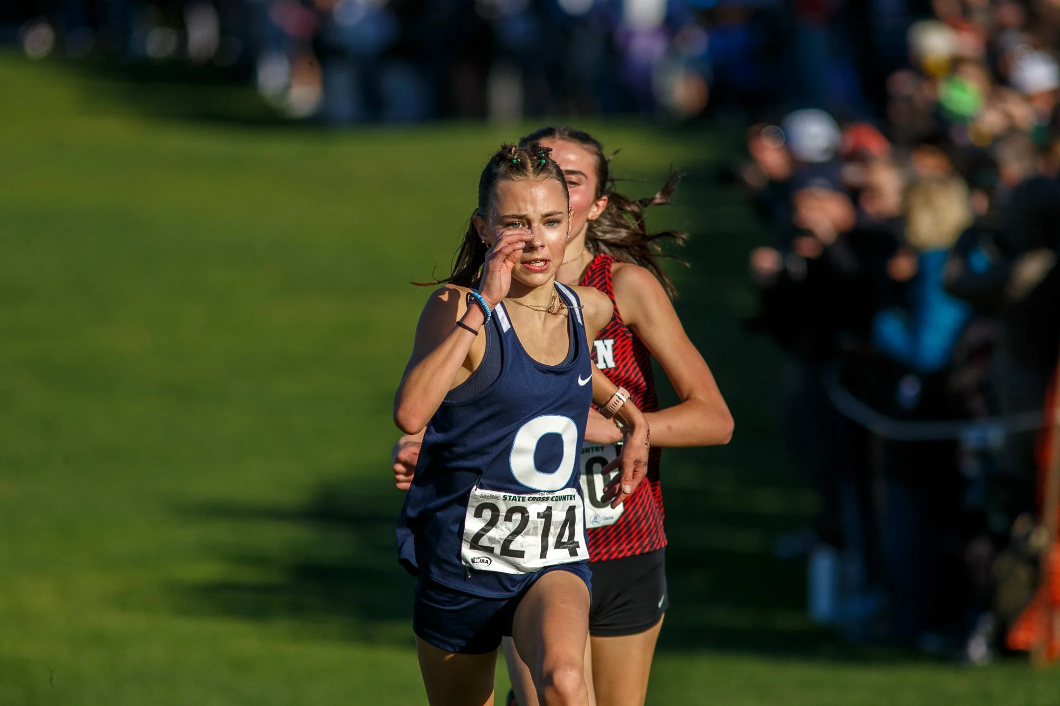 Leah Hennen of Olympia High School focused while running at the state cross country championships.