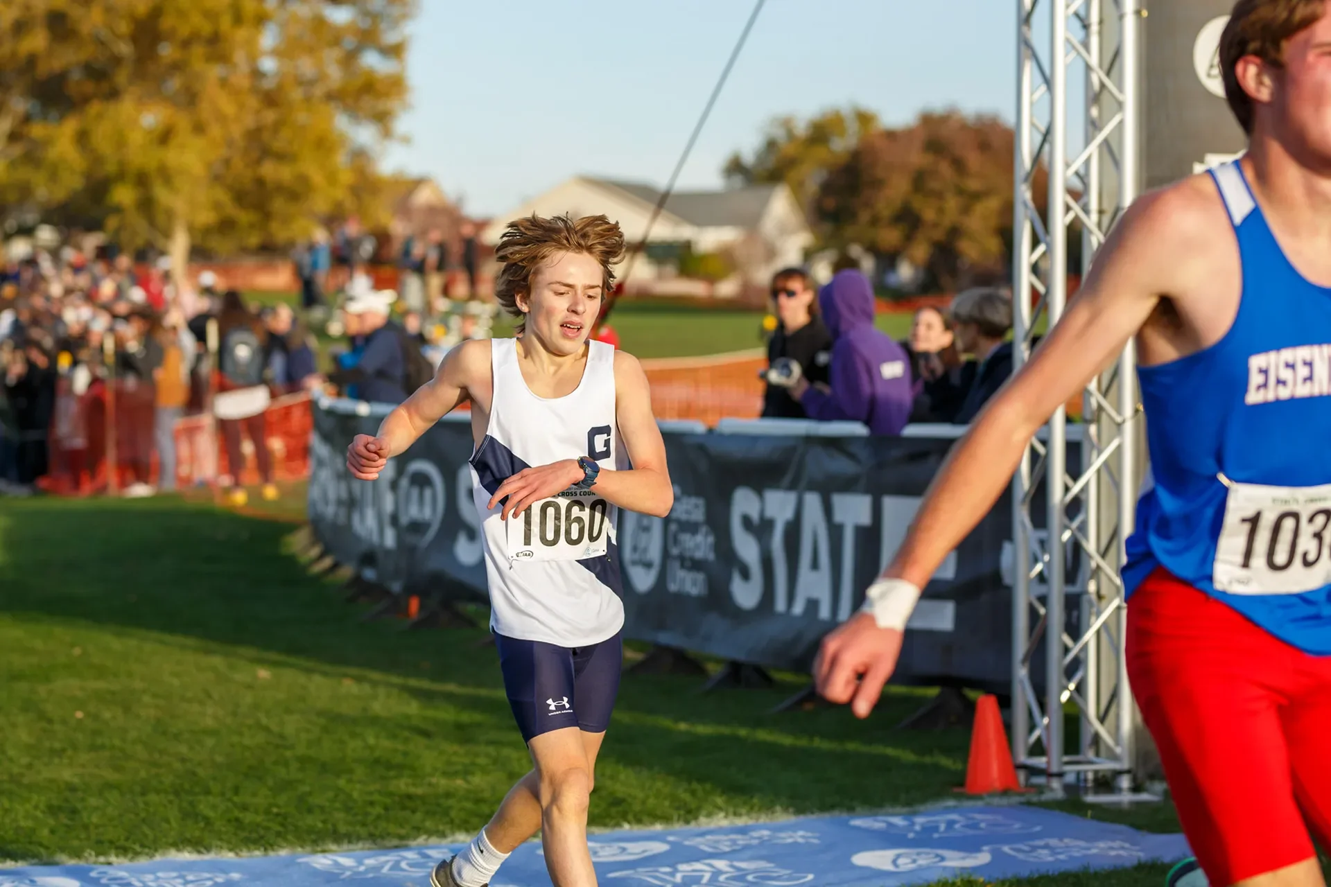 Washington high school cross country freshman Miro Parr-Coffin of Gonzaga Prep crossing the finish line at the WIAA State XC Championships.