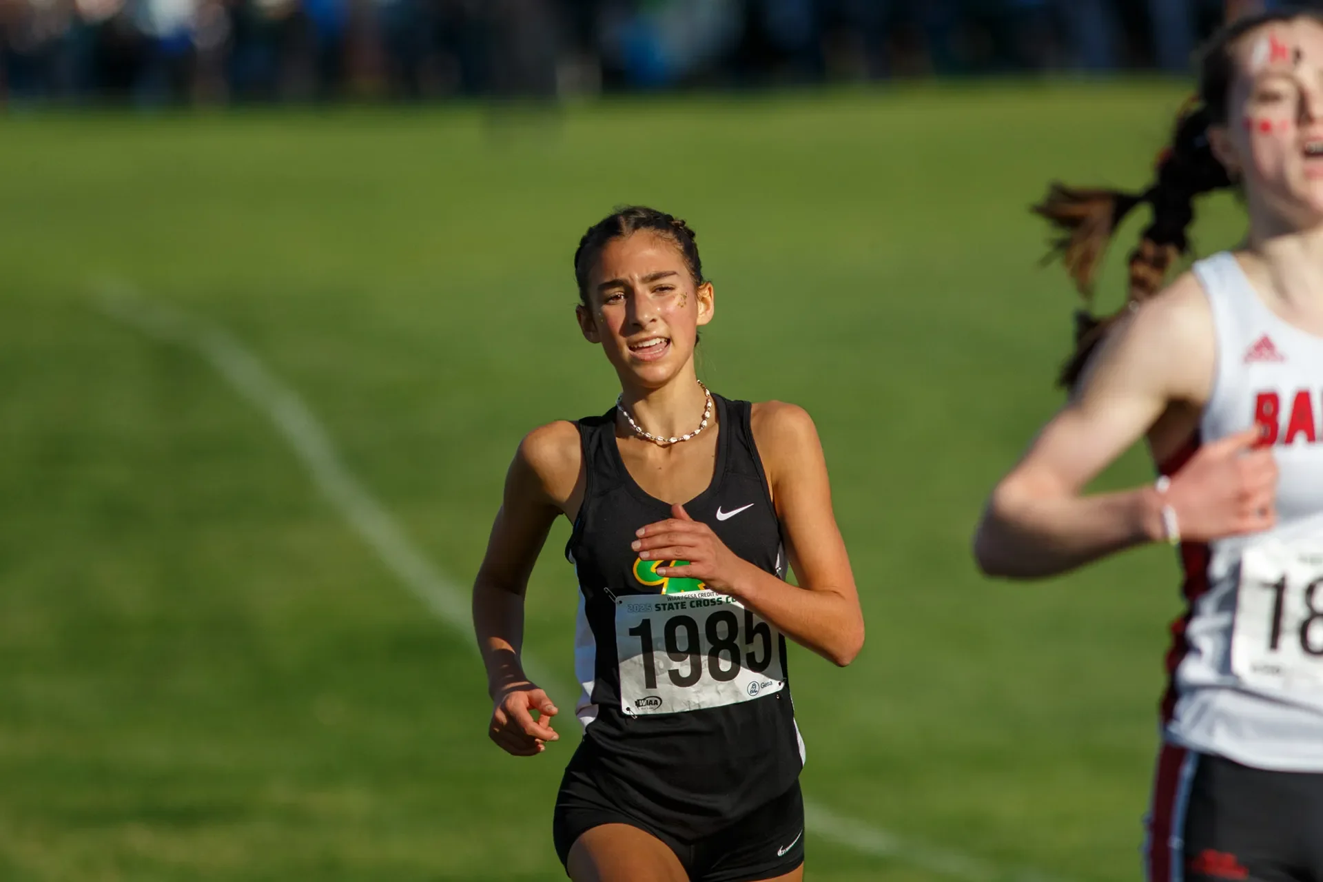 Washington high school track freshman Lilly Lendrum Fort of Roosevelt High School competing in the girls cross country state championship