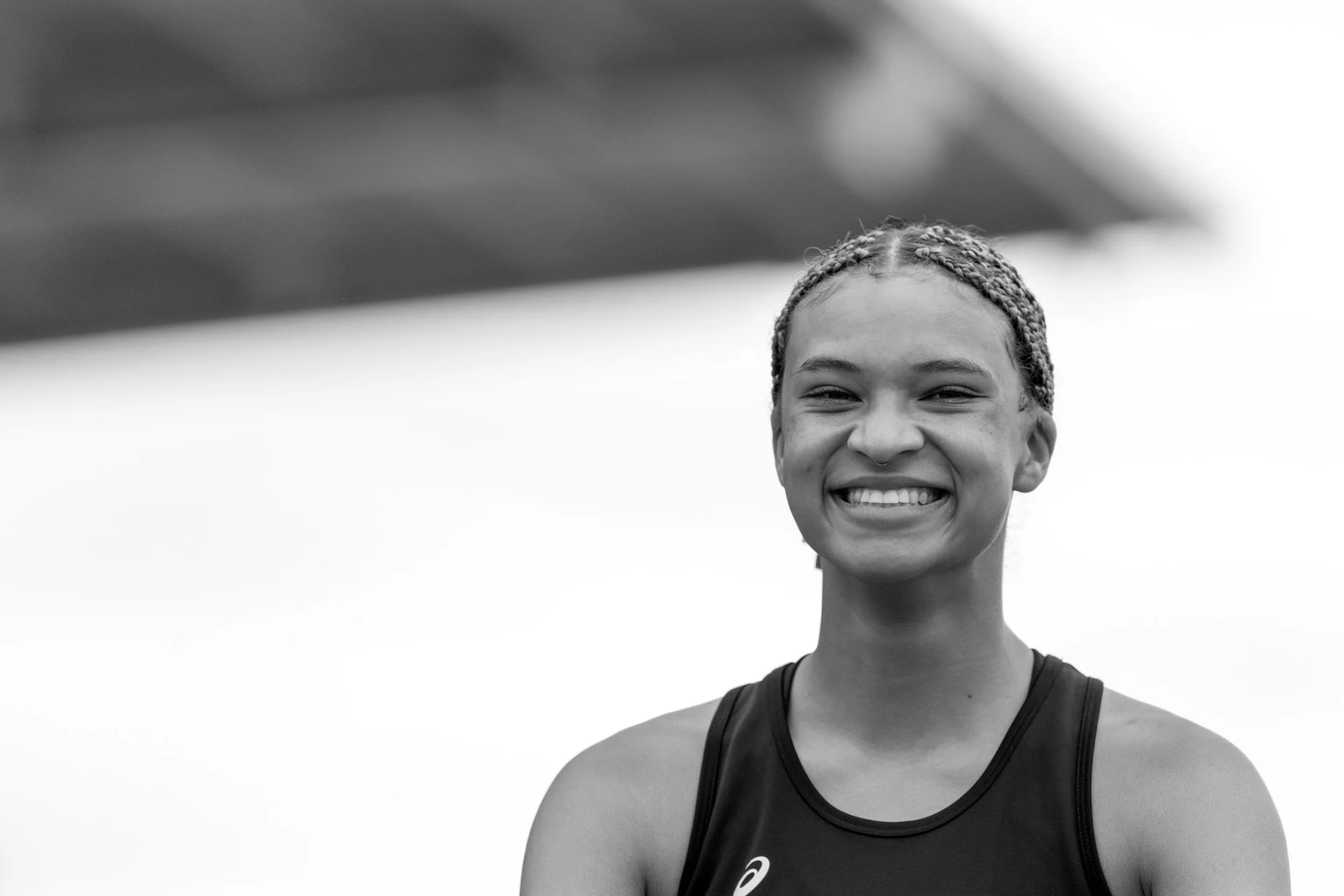 Joyful candid senior photo of a cross country runner in the Pacific Northwest.