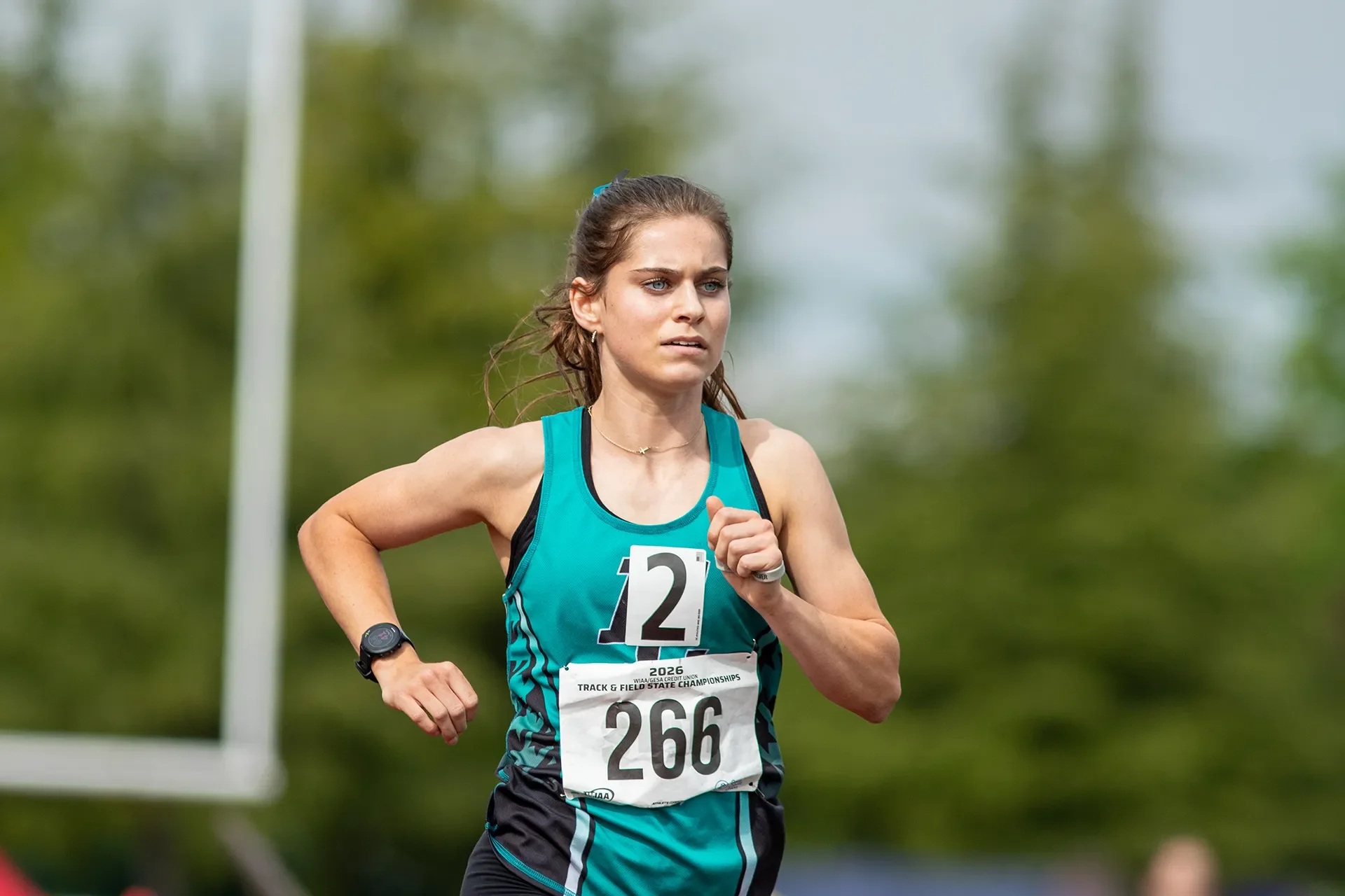 Latham West of Bonney Lake High School winning the 4A girls 1600M state championship race.