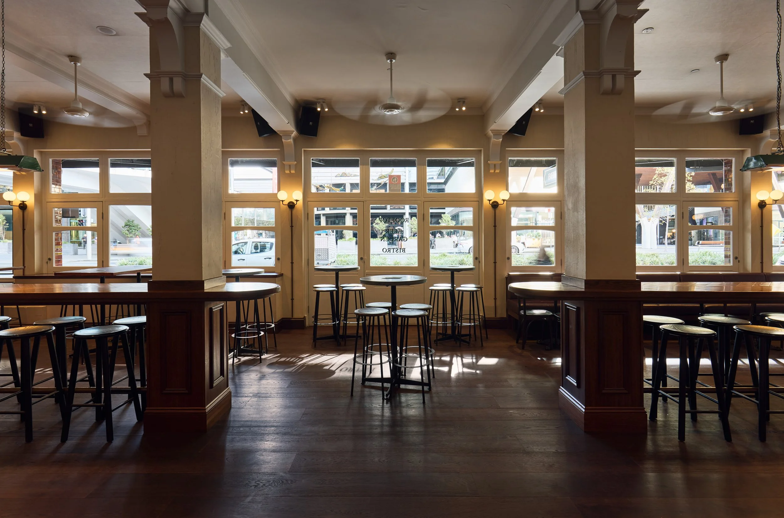High-top tables with chairs, view of city