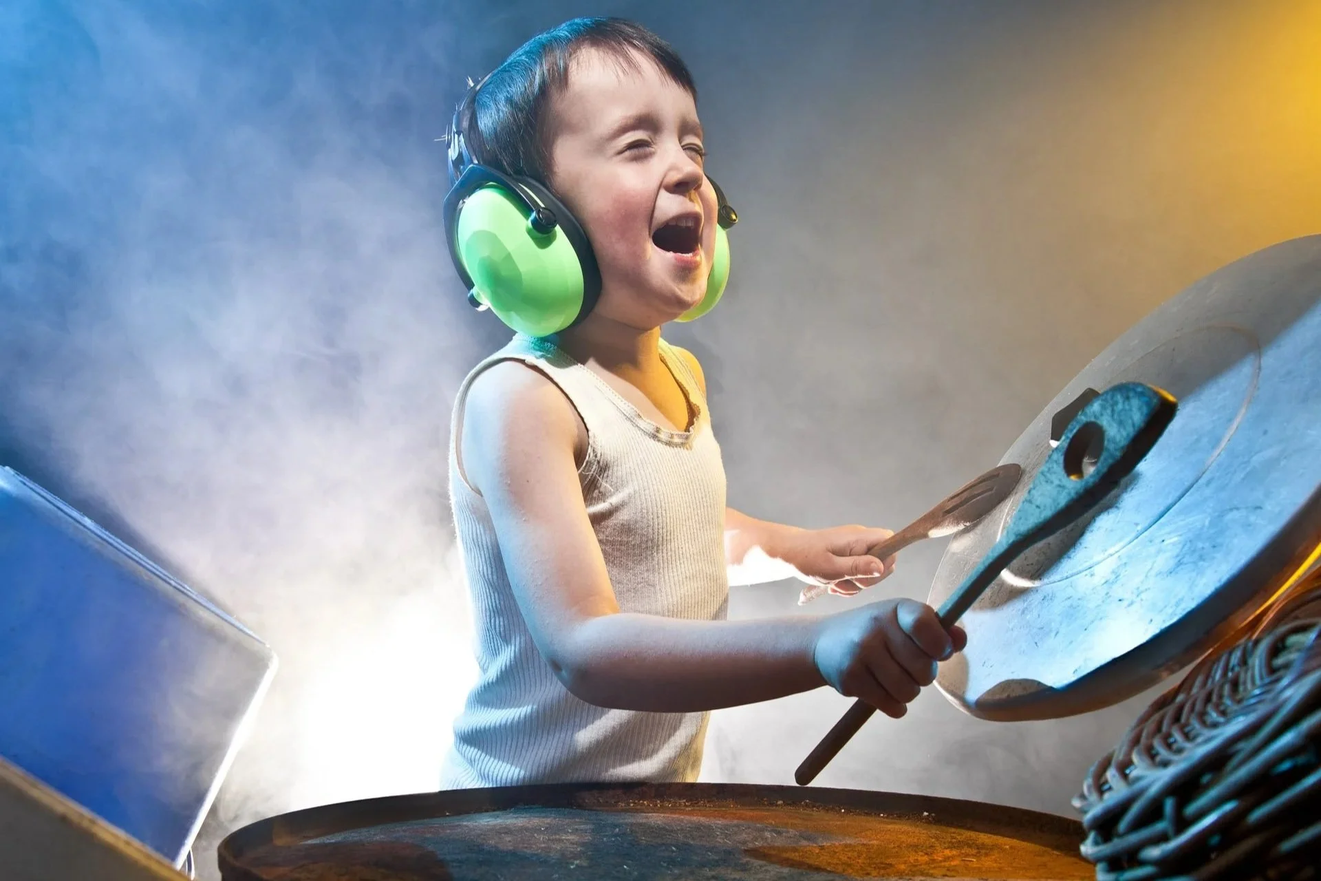 Photograph of a young boy playing drums with found objects. Commercial project for Sony's Make.Believe campaign by Melbourne photographer, Ross Calia