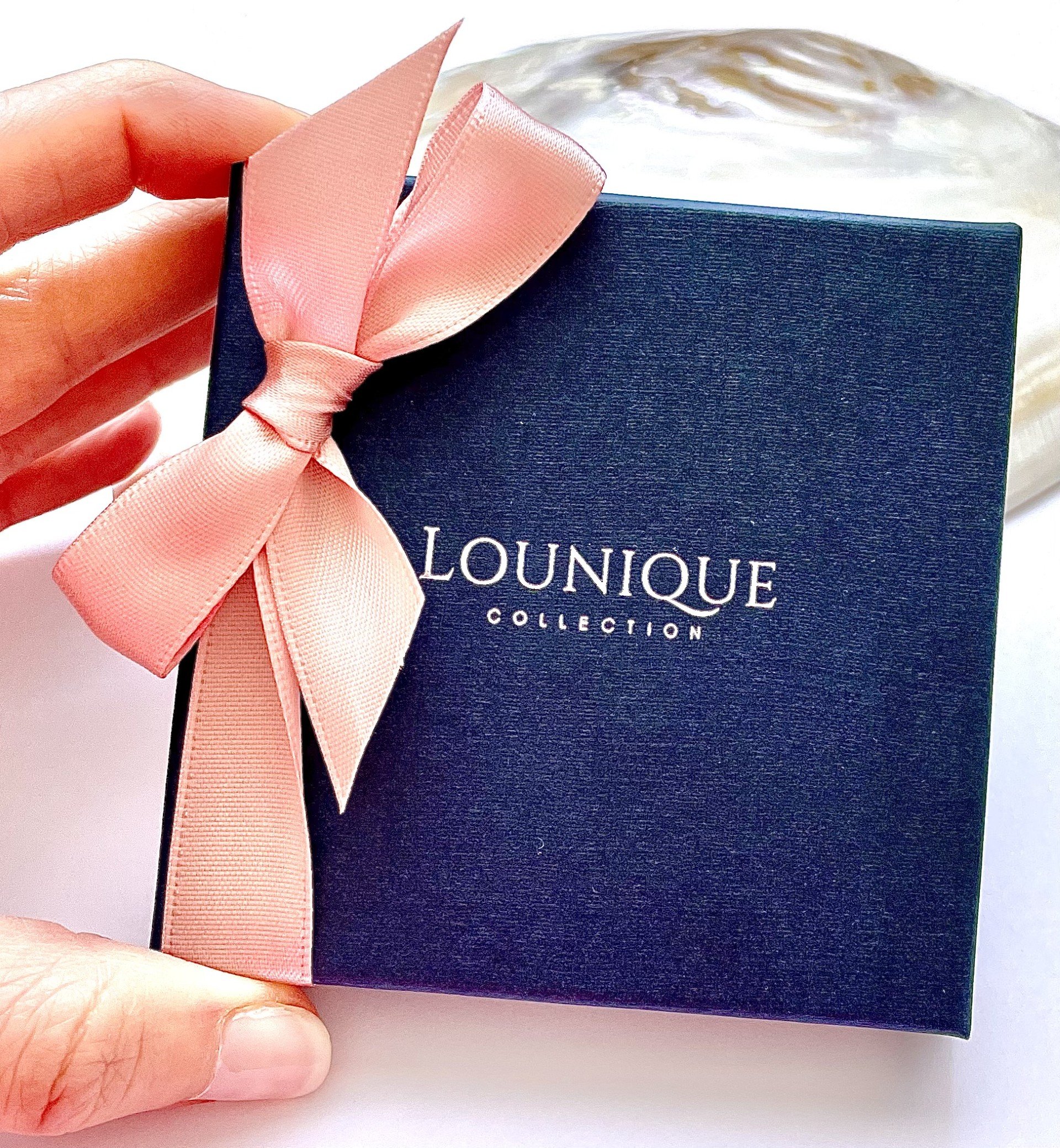Gift box photo - with hand.jpg