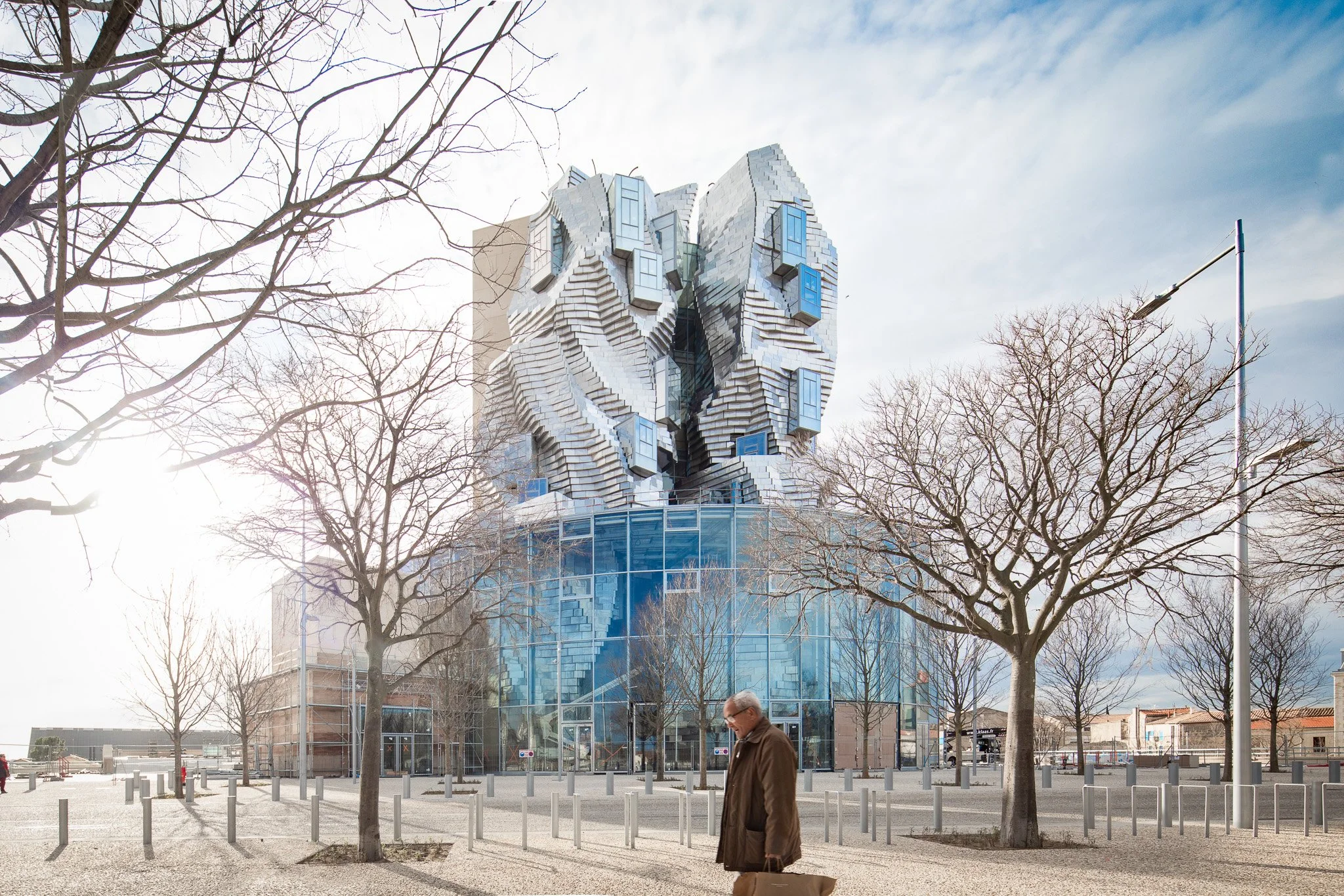 Frank Gehry - Luma Tower - Modern, Architecture, Building, Metallic, Reflective, Windows, Irregular Shapes, Patterns, Abstract Design, Silver Color, Geometric Complexity, Facade Distortion