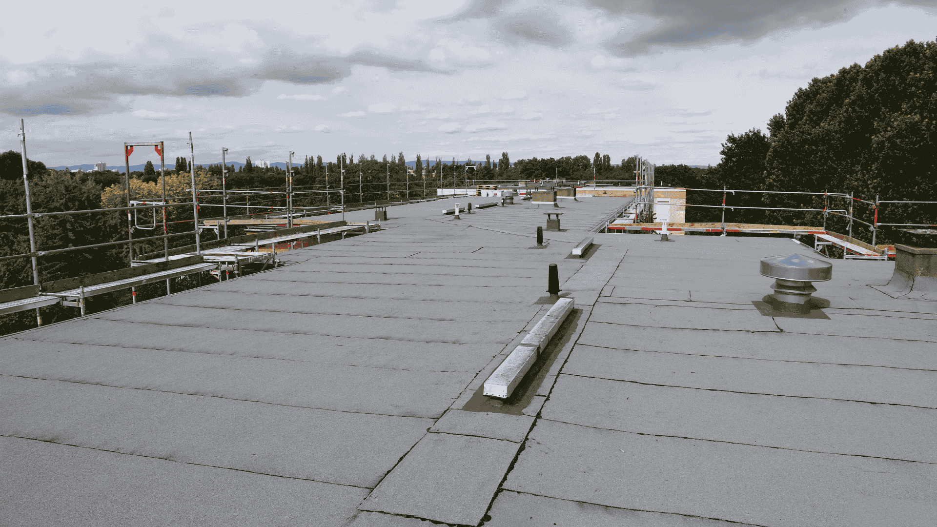 Solar installation on a flat roof utilizing ballasted equipment for businesses.