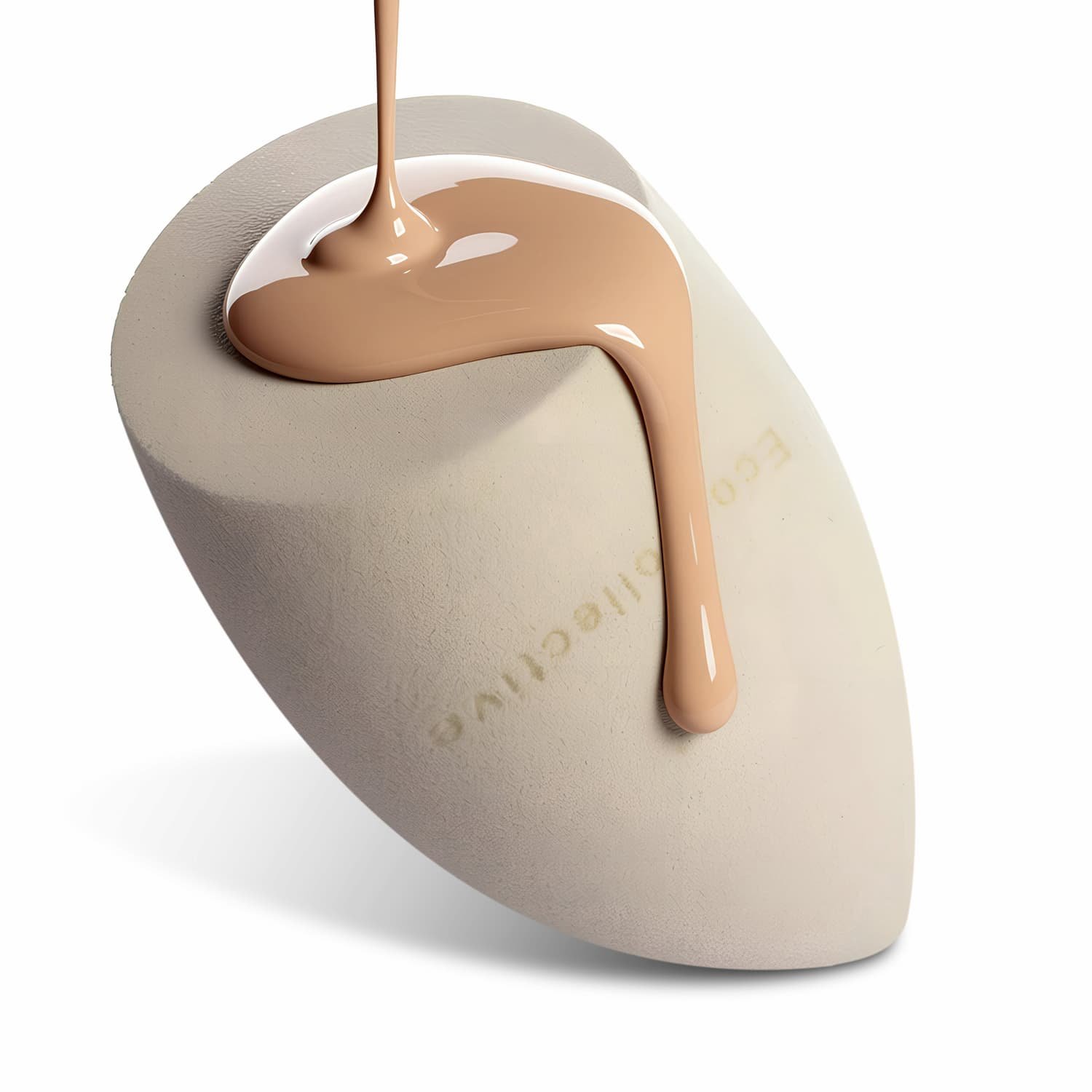 Close-up of a beige, oval-shaped object with a smooth surface, with a drop of beige-colored liquid being poured onto it.