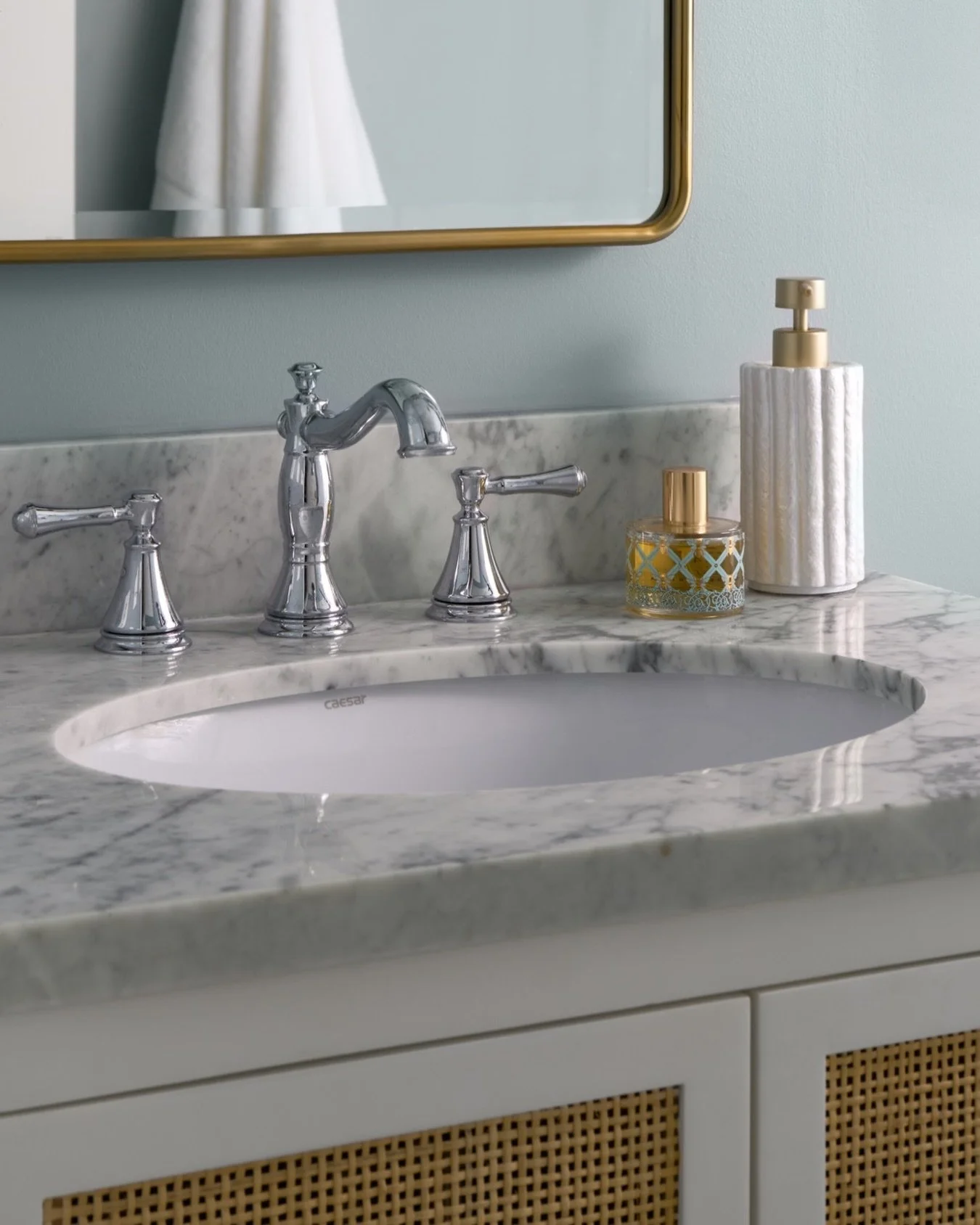 bathroom that whispers coastal charm while still feeling timeless and sophisticated&mdash;that was the goal for this space.

We leaned into a soft, serene palette and layered in textures that feel collected rather than themed. The vanity features a r