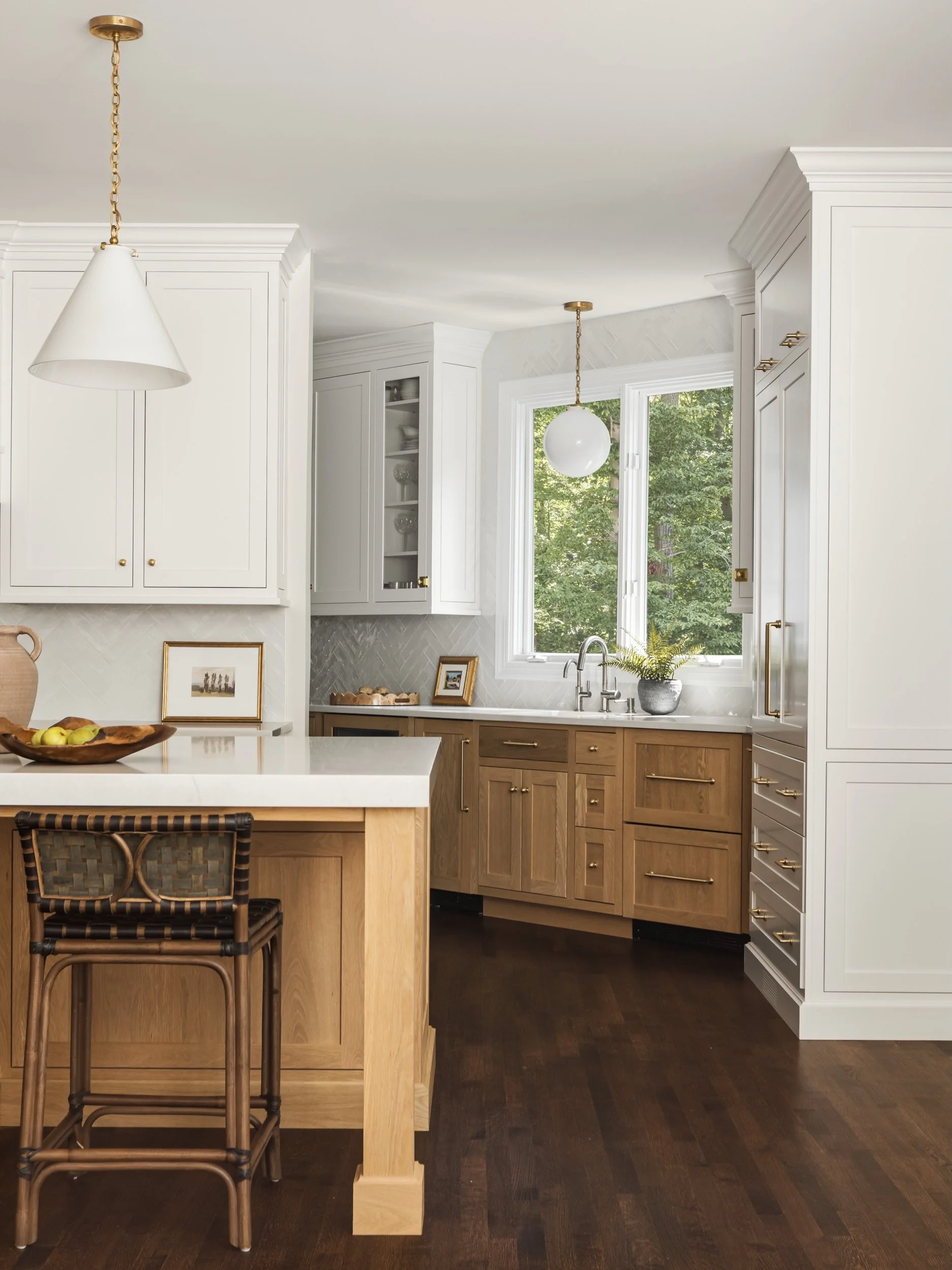 The secret to a timeless kitchen? It&rsquo;s all about the mix!

We love blending stainless steel appliances, textured tile backsplashes, light wood tones, and touches of brass for that perfect balance of warmth and sophistication. Each piece adds it