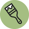 Paintbrush with black handle and white bristles inside a green circle.