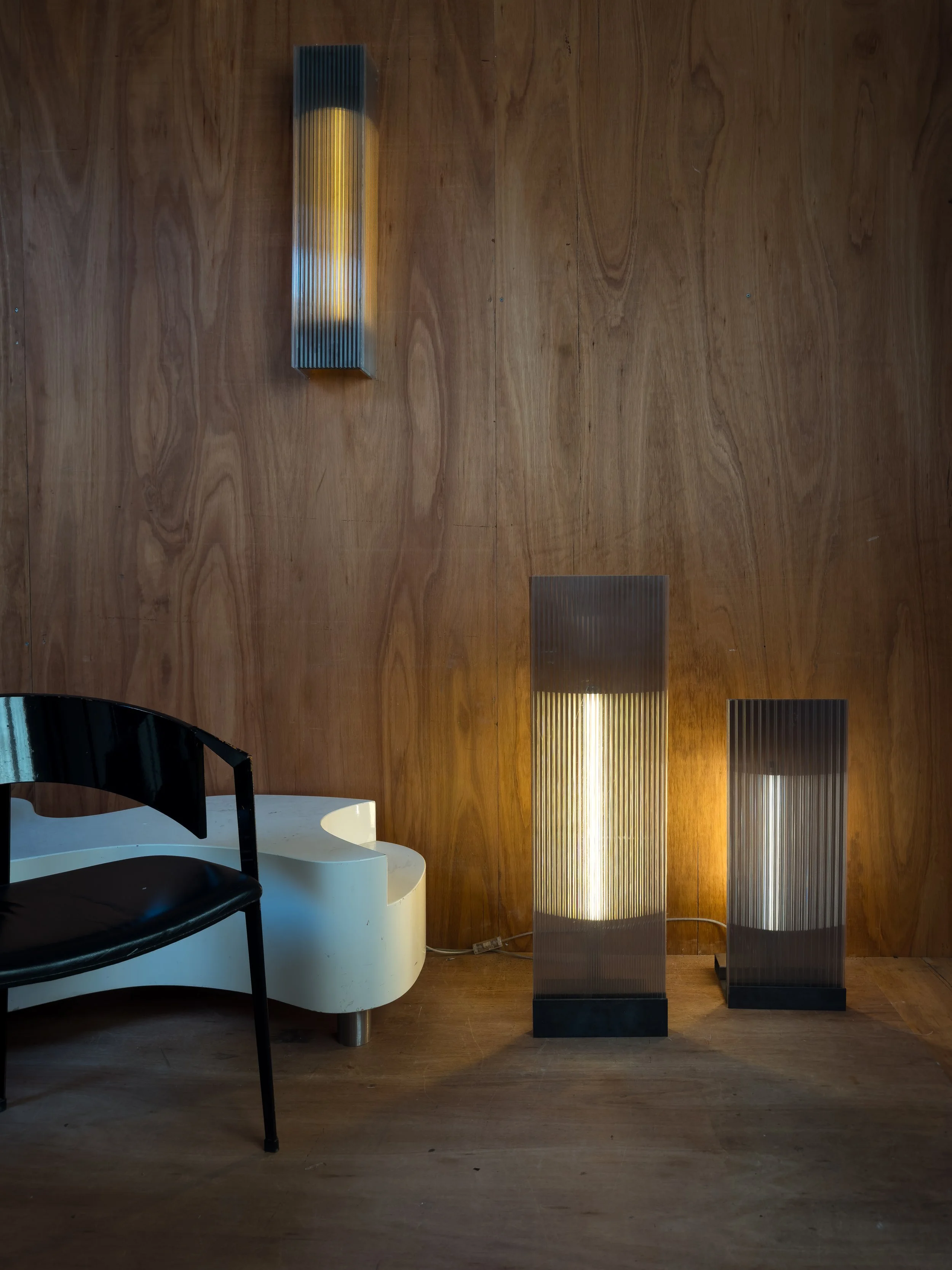 POLY-C-1 extra tall smoke brown (with yellow LED tube), next to POLY-C-1 smoke grey