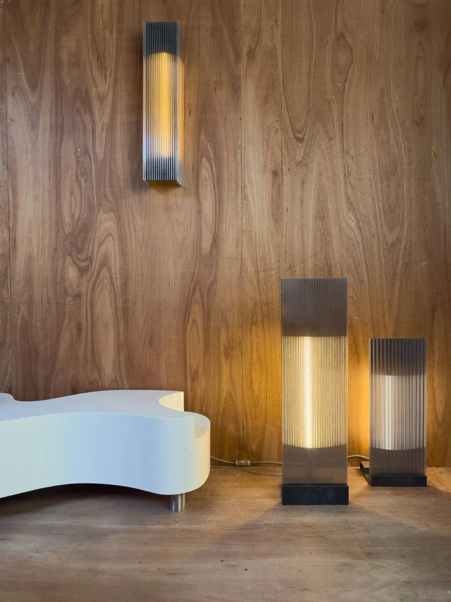 POLY-C-1 extra tall smoke brown (with yellow LED tube), next to POLY-C-1 smoke grey