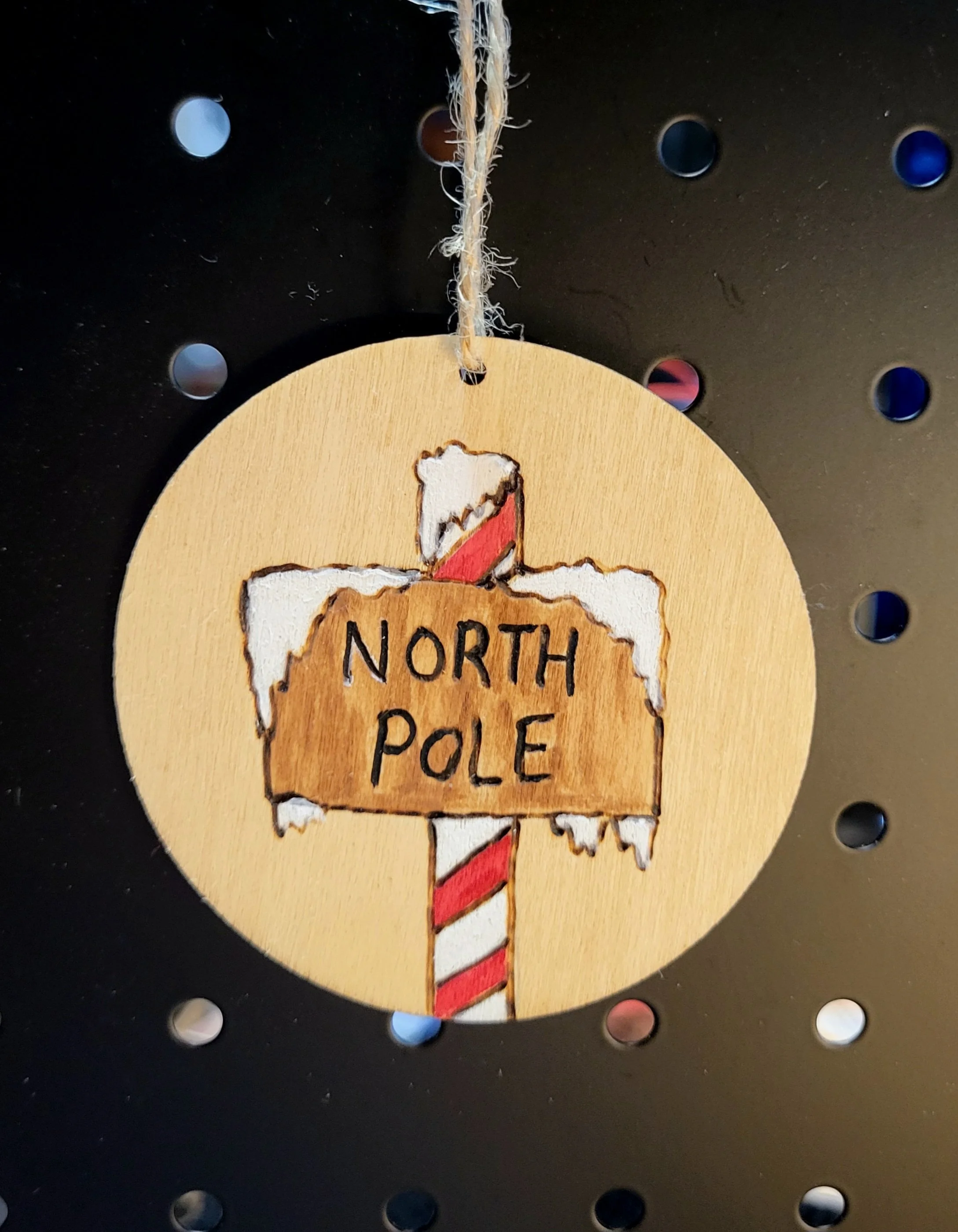 #67-north pole sign ornament