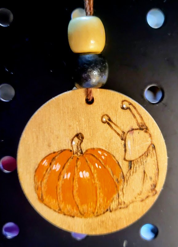 #73 pumpkin snail ornament