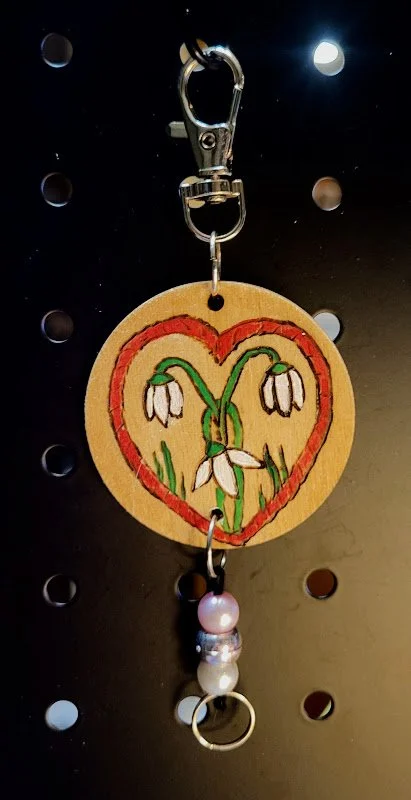 #69 heart with lillies ornament