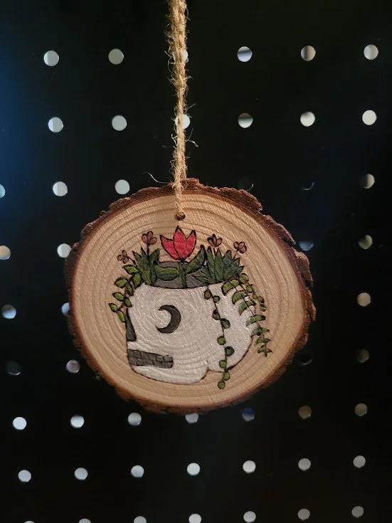 #82-skull planter ornament.jpg