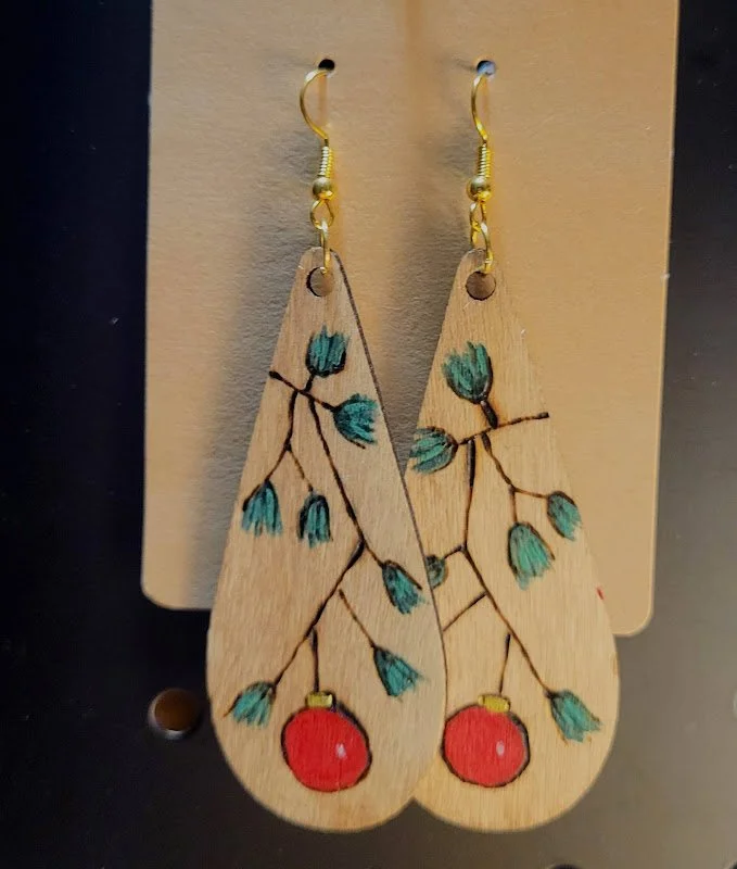 #109 lg tree branch with ornament