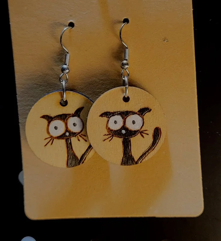 #131 skinny black cat earrings