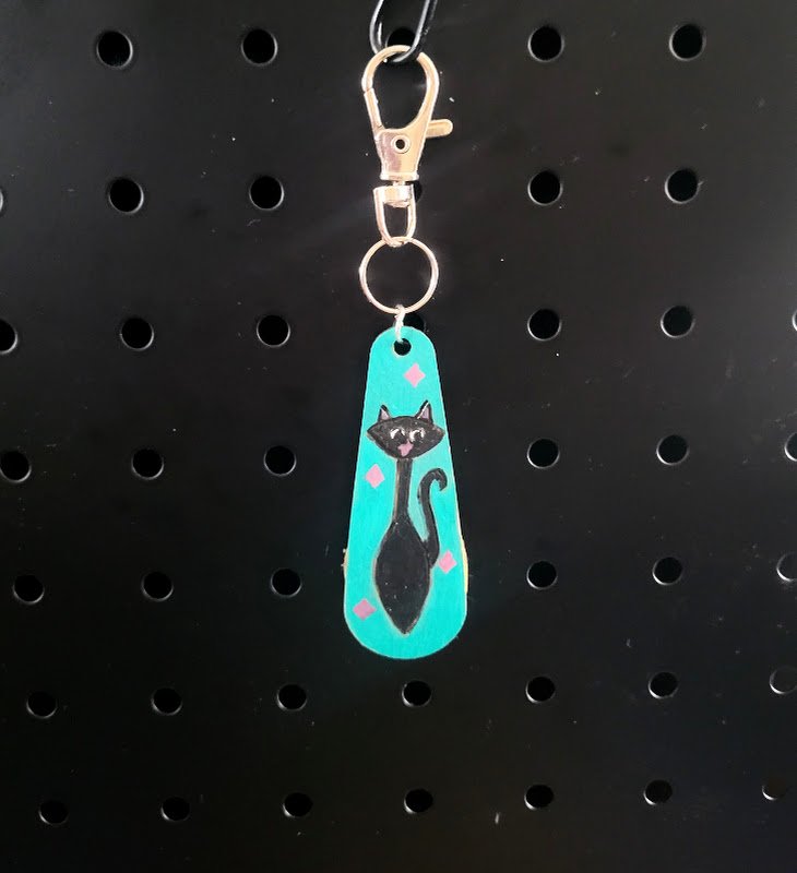 #304 hourglass cat bag charm