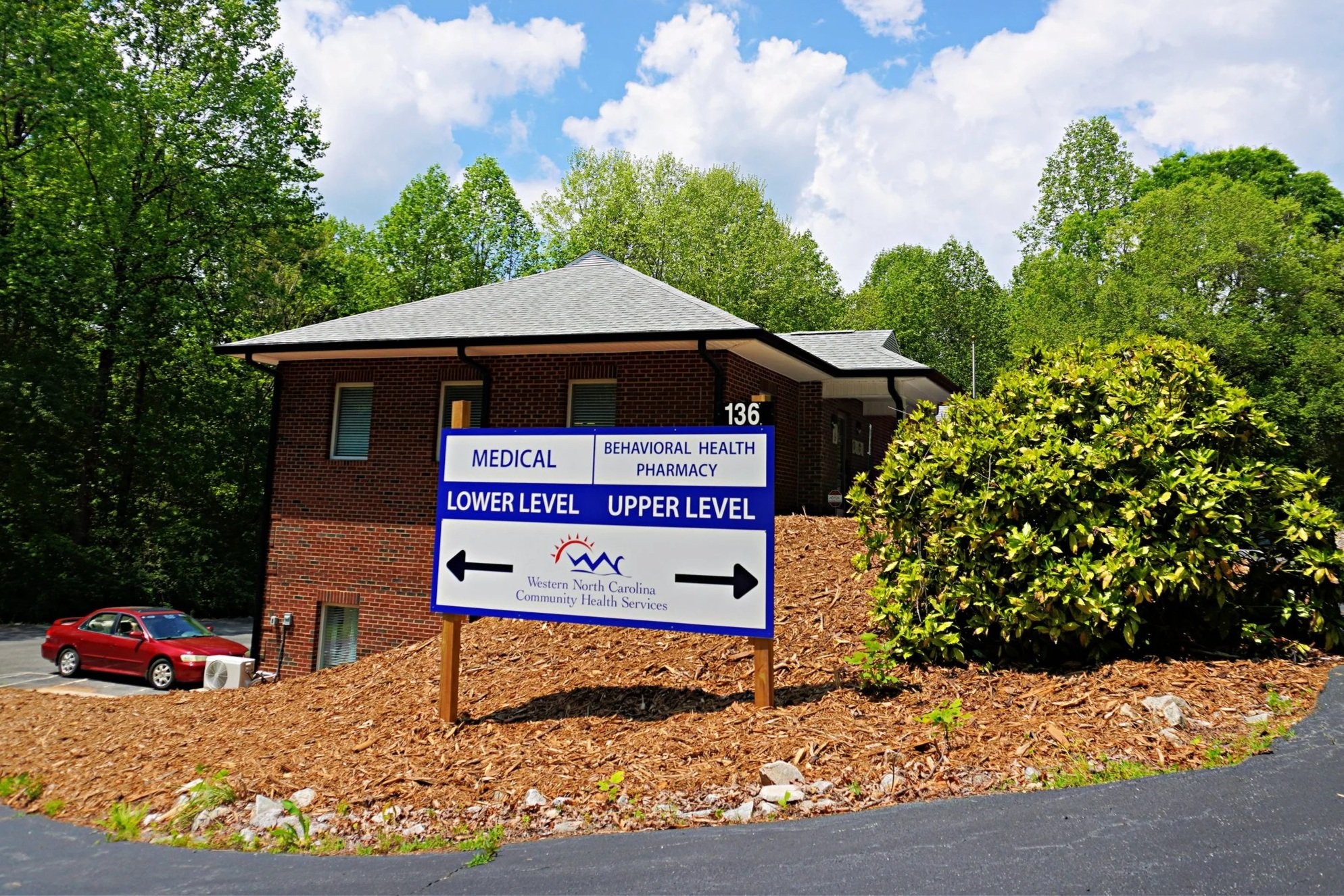 The outside of the McDowell Health Center building, which is a two story brick building.