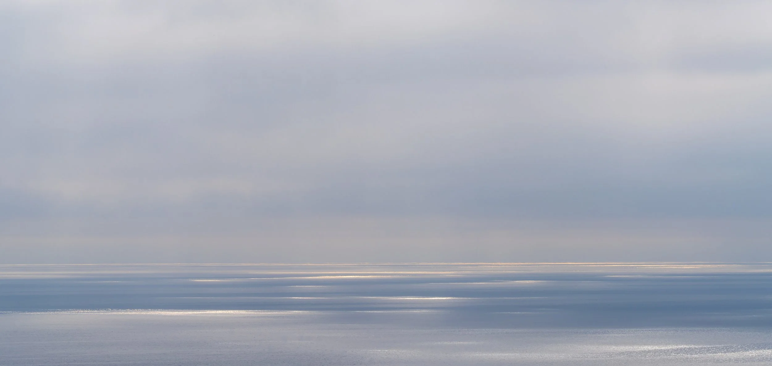 Horizon sun patches on water tall color.jpg