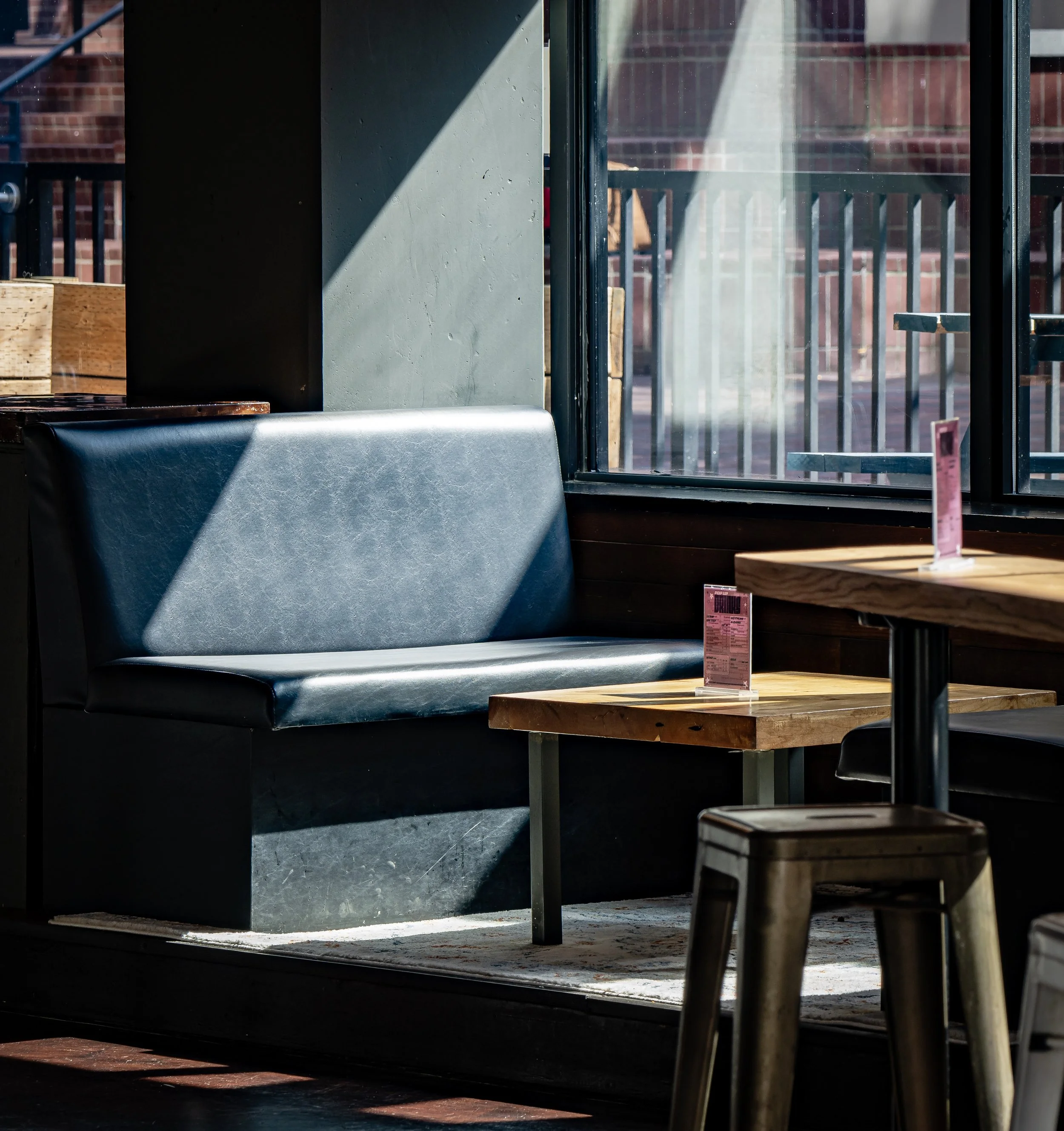 Booth and tables in sun and shadow.jpg
