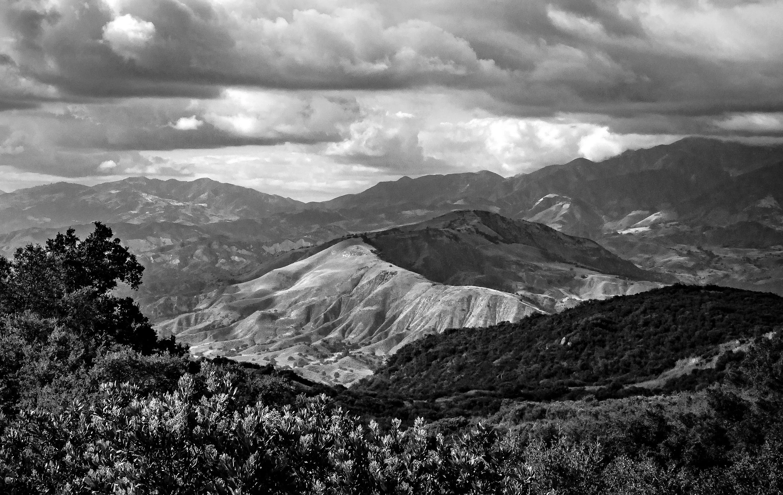 Camino Cielo looking back under clouds bnw.jpg