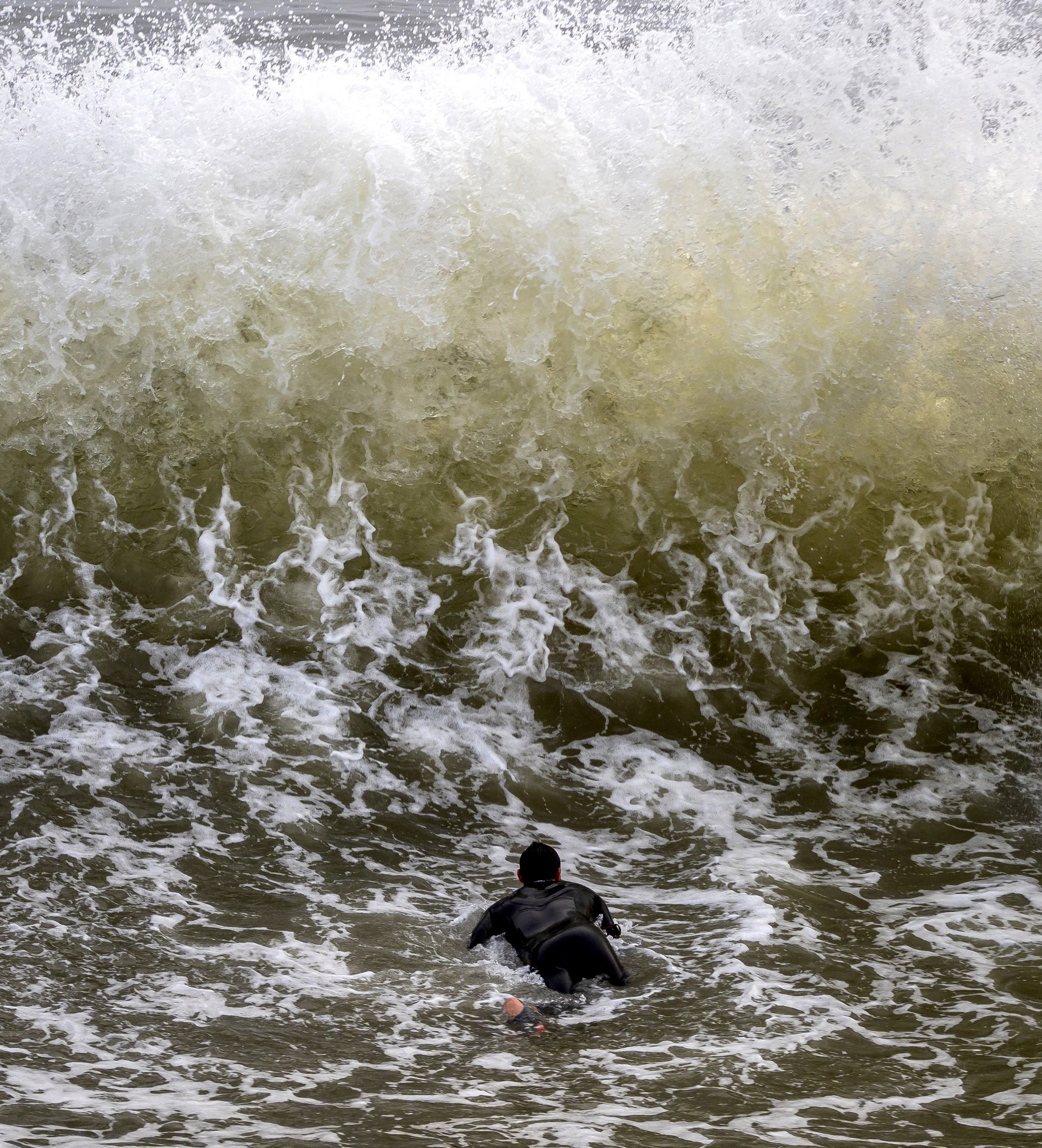 Paddling into backwash wall.jpg