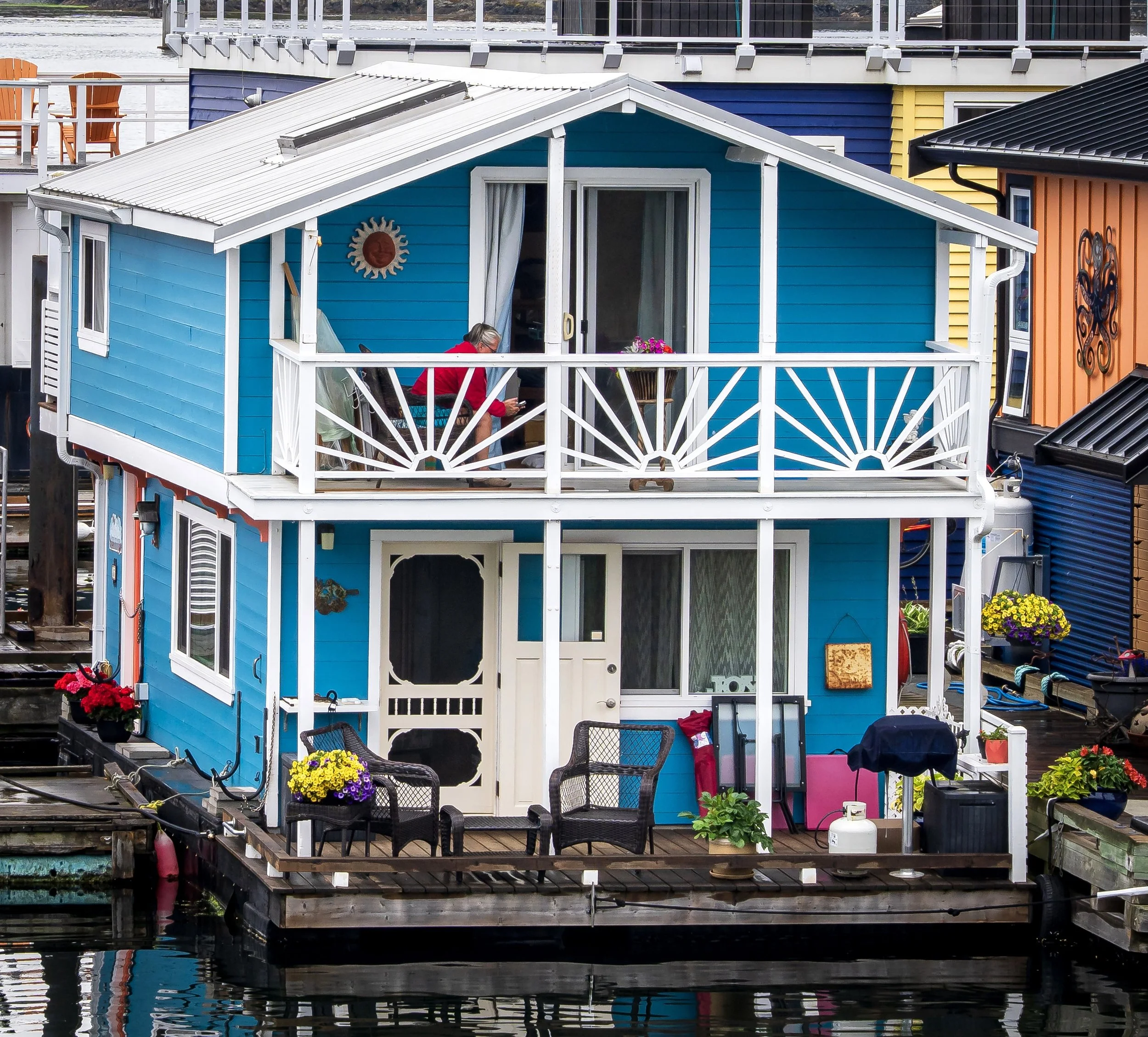 Houseboat reader on balcony.jpg