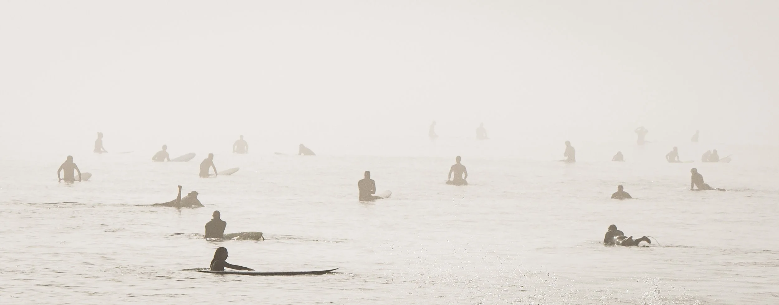 Surfers in the haze.jpg