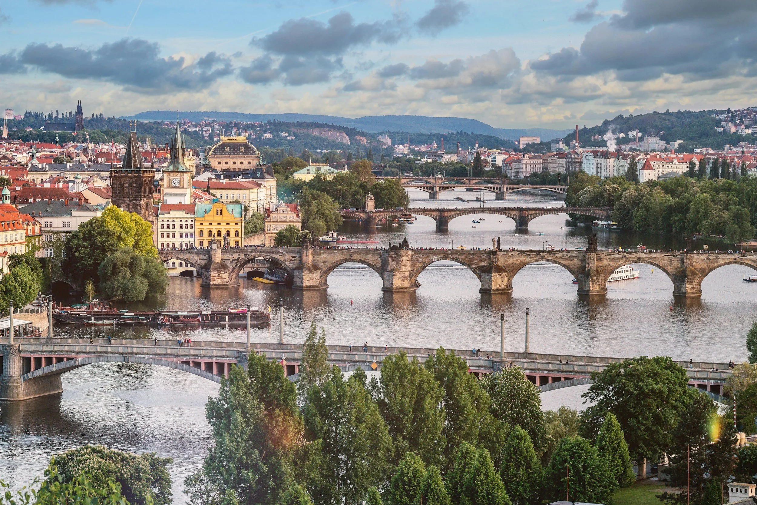 Panoramic view of Prague with Charles Bridge and Vltava river from above